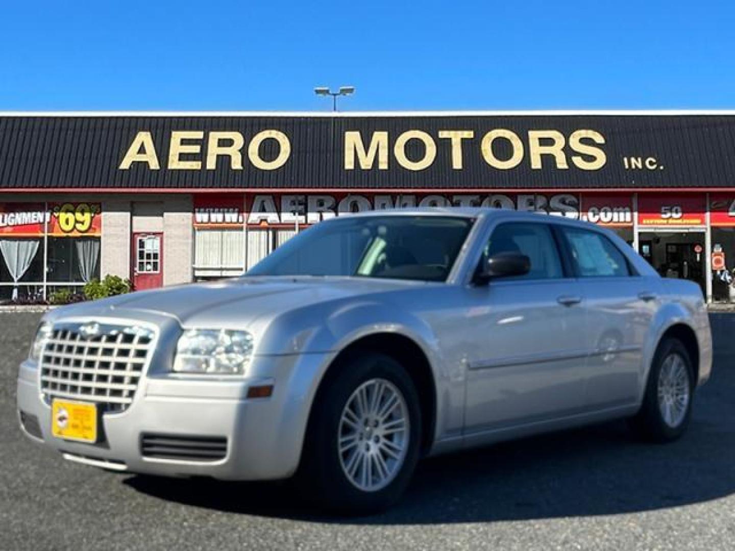 2009 Silver Chrysler 300 LX (2C3KA43DX9H) with an 2.7L 6 Cylinder Sequential-Port F.I. engine, Automatic transmission, located at 50 Eastern Blvd., Essex, MD, 21221, (410) 686-3444, 39.304367, -76.484947 - Photo#0