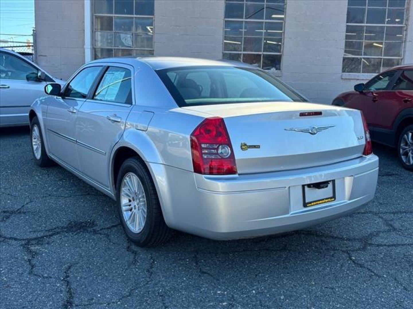 2009 Silver Chrysler 300 LX (2C3KA43DX9H) with an 2.7L 6 Cylinder Sequential-Port F.I. engine, Automatic transmission, located at 50 Eastern Blvd., Essex, MD, 21221, (410) 686-3444, 39.304367, -76.484947 - Photo#2