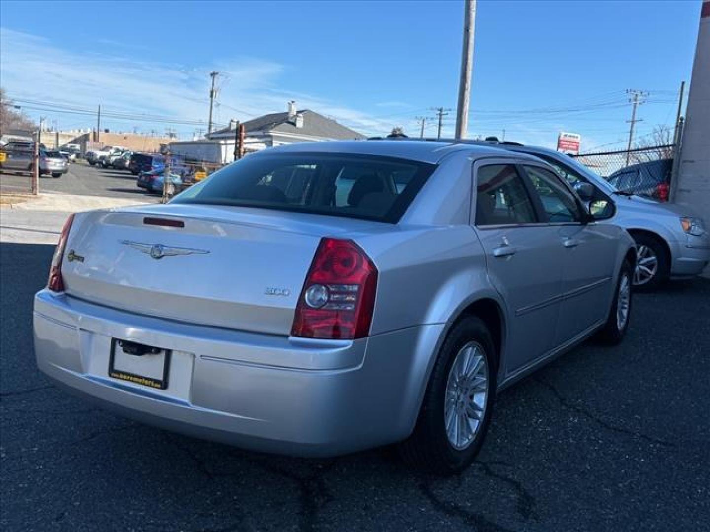 2009 Silver Chrysler 300 LX (2C3KA43DX9H) with an 2.7L 6 Cylinder Sequential-Port F.I. engine, Automatic transmission, located at 50 Eastern Blvd., Essex, MD, 21221, (410) 686-3444, 39.304367, -76.484947 - Photo#4