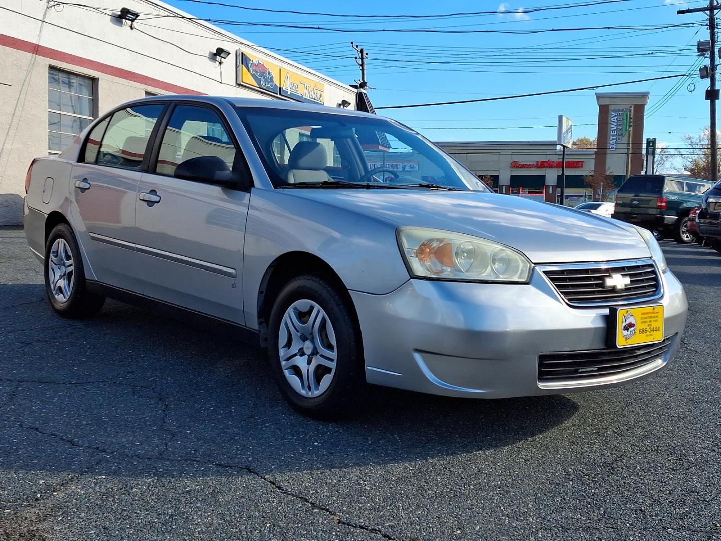 2006 Silverstone Metallic - 67U /Titanium - 83 Chevrolet Malibu LS w/1LS (1G1ZS51F36F) with an ENGINE, ECOTEC 2.2L DOHC, 16-VALVE, 4-CYLINDER, MFI engine, located at 50 Eastern Blvd., Essex, MD, 21221, (410) 686-3444, 39.304367, -76.484947 - Step into comfort and reliability with this 2006 Chevrolet Malibu LS w/1LS 4dr Sdn LS w/1LS. This sedan, dressed in an elegant Silverstone Metallic exterior, exudes sophistication and strength on the road. Inside, the car is styled with a high-quality Titanium interior, ensuring an expression of cla - Photo#2