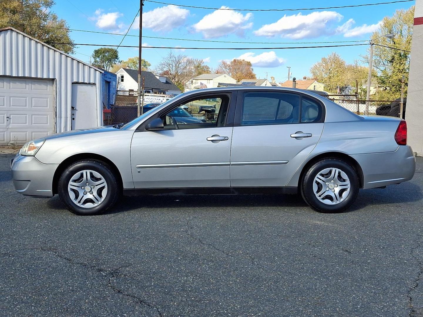 2006 Silverstone Metallic - 67U /Titanium - 83 Chevrolet Malibu LS w/1LS (1G1ZS51F36F) with an ENGINE, ECOTEC 2.2L DOHC, 16-VALVE, 4-CYLINDER, MFI engine, located at 50 Eastern Blvd., Essex, MD, 21221, (410) 686-3444, 39.304367, -76.484947 - Step into comfort and reliability with this 2006 Chevrolet Malibu LS w/1LS 4dr Sdn LS w/1LS. This sedan, dressed in an elegant Silverstone Metallic exterior, exudes sophistication and strength on the road. Inside, the car is styled with a high-quality Titanium interior, ensuring an expression of cla - Photo#6