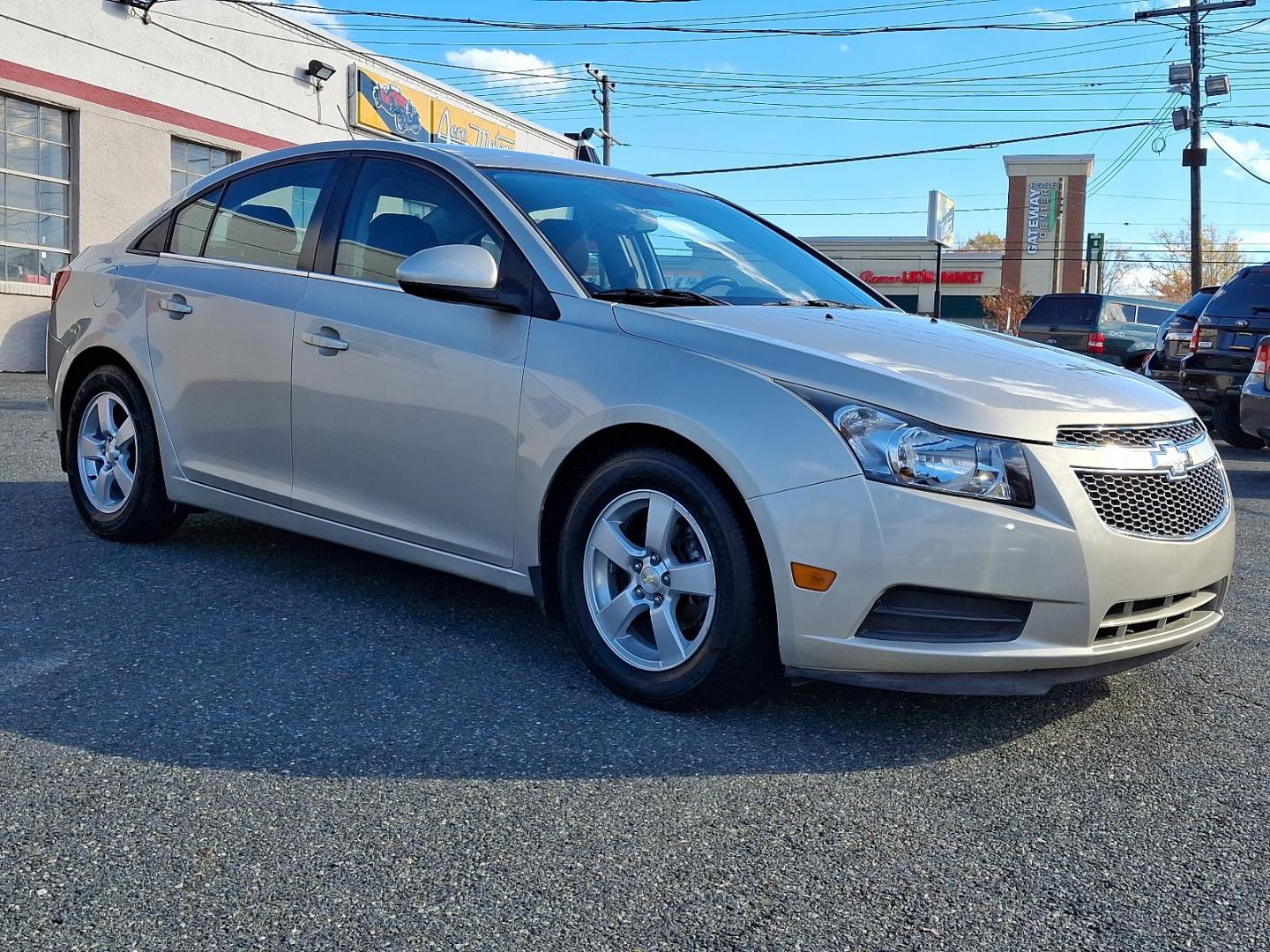 2014 Beige Chevrolet Cruze 1LT Auto (1G1PC5SB7E7) with an 1.4L 4 Cylinder Sequential-Port F.I. engine, Automatic transmission, located at 50 Eastern Blvd., Essex, MD, 21221, (410) 686-3444, 39.304367, -76.484947 - Photo#2