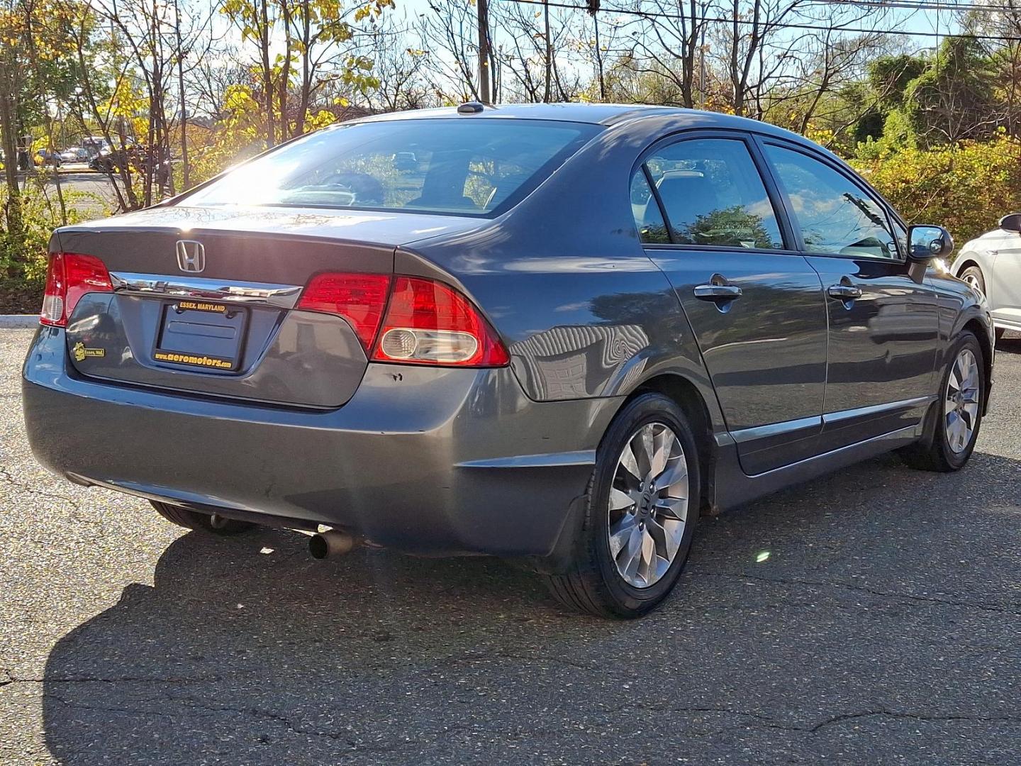 2009 Polished Metal Metallic - GY /Gray - GR Honda Civic Sdn EX-L (2HGFA16949H) with an 1.8L SOHC MPFI 16-valve i-VTEC I4 engine engine, located at 50 Eastern Blvd., Essex, MD, 21221, (410) 686-3444, 39.304367, -76.484947 - Introducing the 2009 Honda Civic Sedan EX-L with Navigation, a perfect blend of style, performance, and advanced technology. This attractive sedan comes finished in a sleek gray exterior, capturing attention and providing a timeless look. Powered by a fuel-efficient 1.8L SOHC MPFI 16-valve i-VTEC - Photo#3