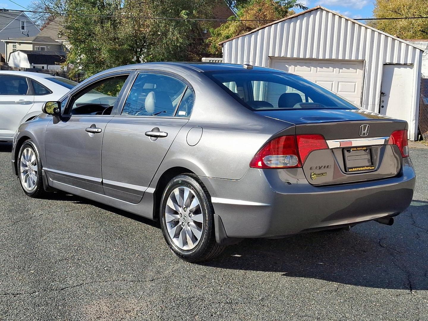 2009 Polished Metal Metallic - GY /Gray - GR Honda Civic Sdn EX-L (2HGFA16949H) with an 1.8L SOHC MPFI 16-valve i-VTEC I4 engine engine, located at 50 Eastern Blvd., Essex, MD, 21221, (410) 686-3444, 39.304367, -76.484947 - Introducing the 2009 Honda Civic Sedan EX-L with Navigation, a perfect blend of style, performance, and advanced technology. This attractive sedan comes finished in a sleek gray exterior, capturing attention and providing a timeless look. Powered by a fuel-efficient 1.8L SOHC MPFI 16-valve i-VTEC - Photo#5