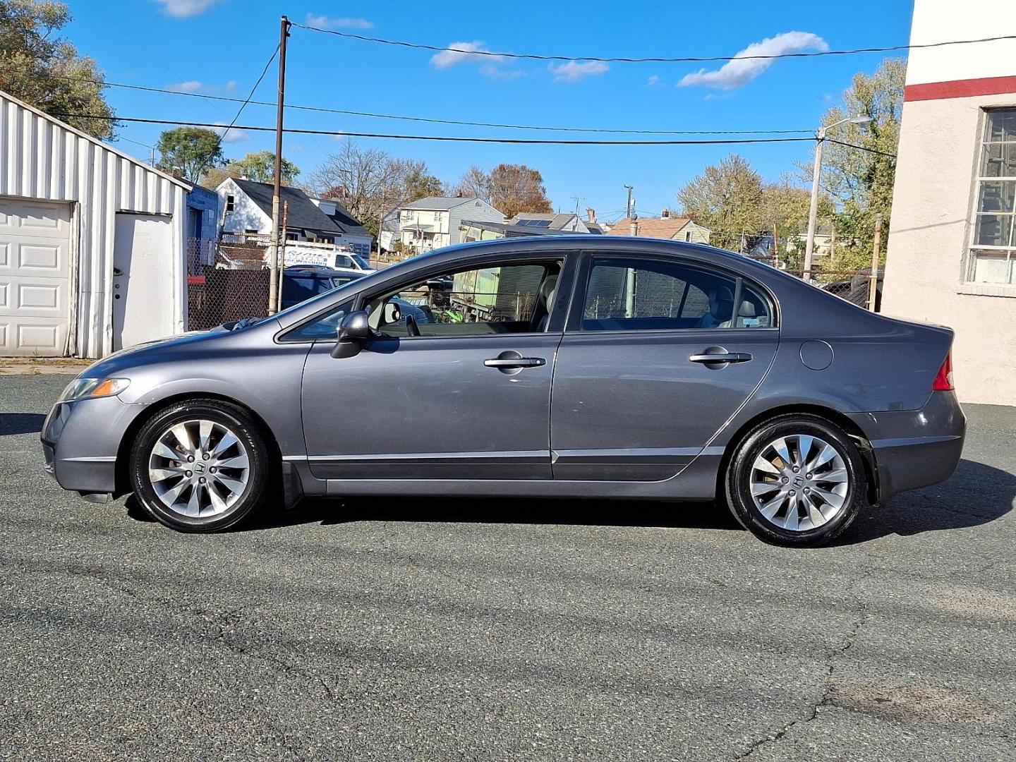 2009 Polished Metal Metallic - GY /Gray - GR Honda Civic Sdn EX-L (2HGFA16949H) with an 1.8L SOHC MPFI 16-valve i-VTEC I4 engine engine, located at 50 Eastern Blvd., Essex, MD, 21221, (410) 686-3444, 39.304367, -76.484947 - Introducing the 2009 Honda Civic Sedan EX-L with Navigation, a perfect blend of style, performance, and advanced technology. This attractive sedan comes finished in a sleek gray exterior, capturing attention and providing a timeless look. Powered by a fuel-efficient 1.8L SOHC MPFI 16-valve i-VTEC - Photo#6