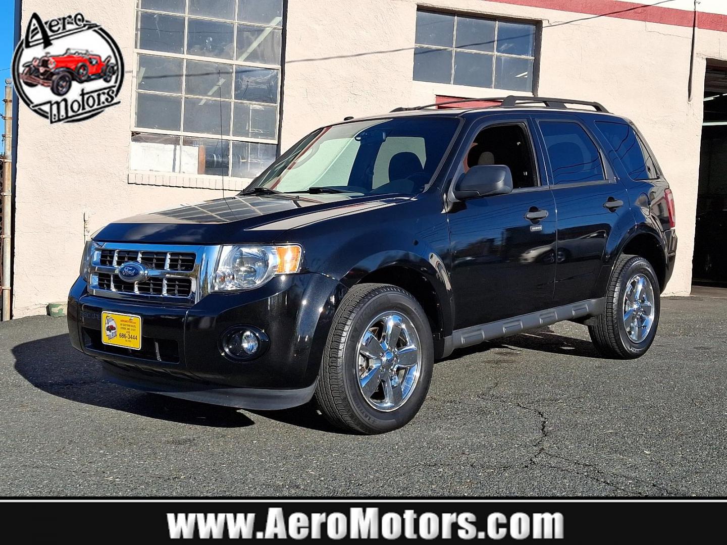 2011 Tuxedo Black Metallic - UH /Charcoal Black - W9 Ford Escape XLT (1FMCU0DG2BK) with an 3.0L V6 FLEX FUEL ENGINE engine, located at 50 Eastern Blvd., Essex, MD, 21221, (410) 686-3444, 39.304367, -76.484947 - Immerse yourself in the superior blend of functionality and style with our 2011 Ford Escape XLT Fwd 4dr XLT. Flaunting a polished black exterior, this vehicle makes a majestic road presence that leaves a lasting impression. Inside, it is powered by a robust 3.0L V6 Flex Fuel engine, delivering impre - Photo#0