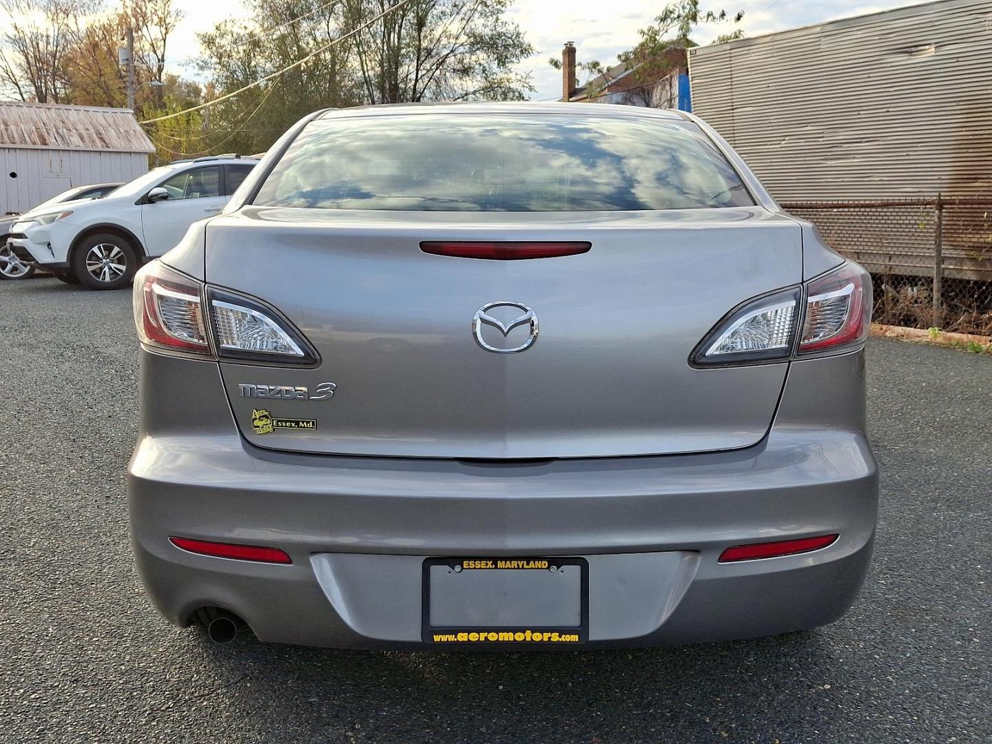 2013 Liquid Silver Metallic - 38P /Black - BU4 Mazda Mazda3 i SV (JM1BL1TG6D1) with an 2.0L DOHC EFI 16-valve I4 engine -inc: variable valve timing (VVT) engine, located at 50 Eastern Blvd., Essex, MD, 21221, (410) 686-3444, 39.304367, -76.484947 - Introducing the 2013 Mazda Mazda3 i SV, a blend of style, performance, and efficiency. With its sleek liquid silver metallic exterior and sophisticated black interior, this sedan is designed to make a lasting impression. Powered by a responsive 2.0L DOHC EFI 16-valve inline-4 engine, the Mazda3 boas - Photo#4