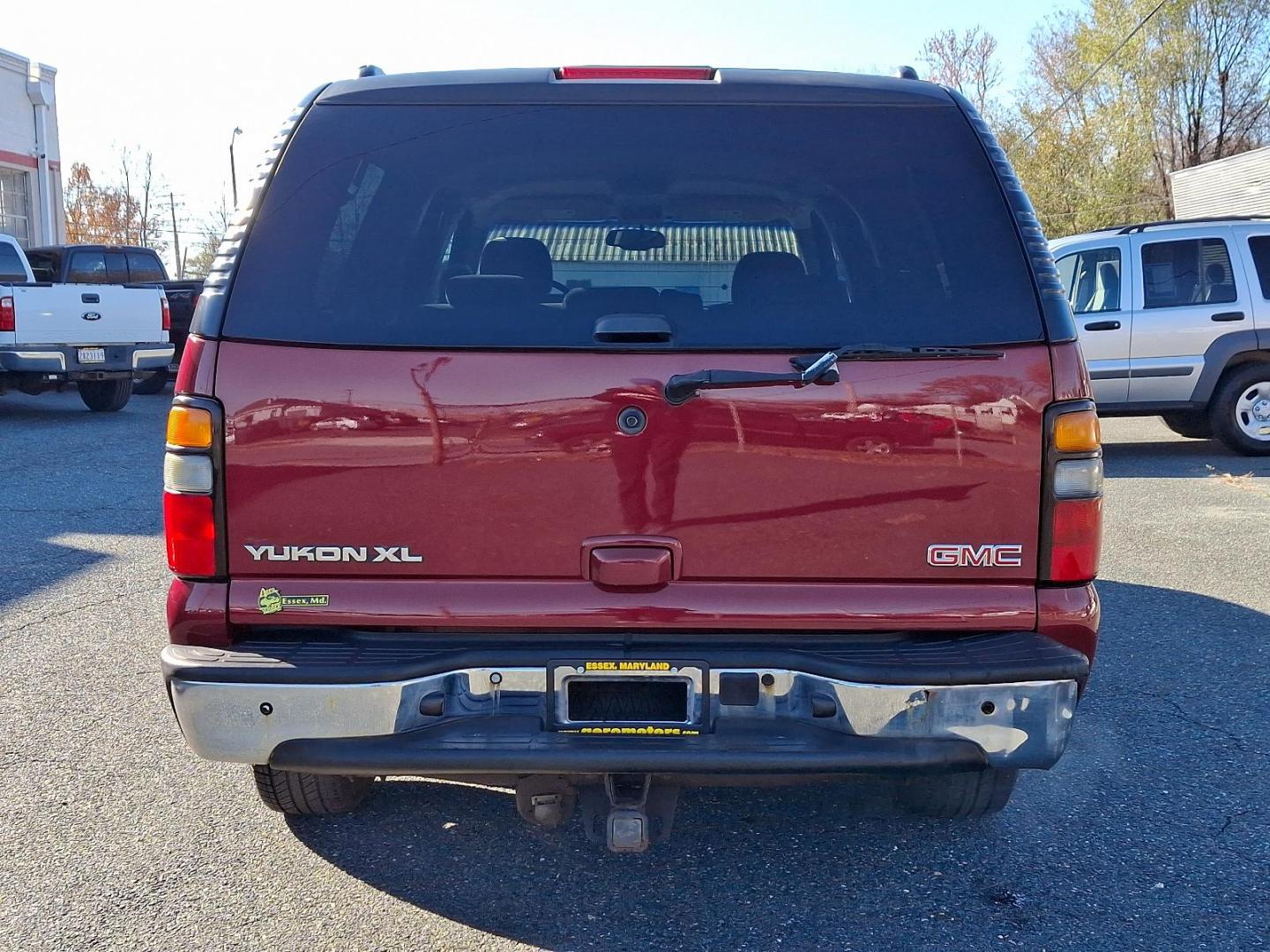 2005 Sport Red Metallic - 63U /Pewter/Dark Pewter - 92 GMC Yukon XL SLE (1GKEC16Z25J) with an ENGINE, VORTEC 5300 V8 SFI FLEX-FUEL, CAPABLE OF RUNNING ON UNLEADED OR UP TO 85% ETHANOL engine, located at 50 Eastern Blvd., Essex, MD, 21221, (410) 686-3444, 39.304367, -76.484947 - Discover the versatility and power of the 2005 GMC Yukon XL SLE, a spacious and reliable SUV designed to meet all your needs. Featuring an eye-catching Sport Red Metallic exterior paired with a sophisticated Pewter/Dark Pewter interior, this vehicle combines style with comfort. Under the hood, the - Photo#4