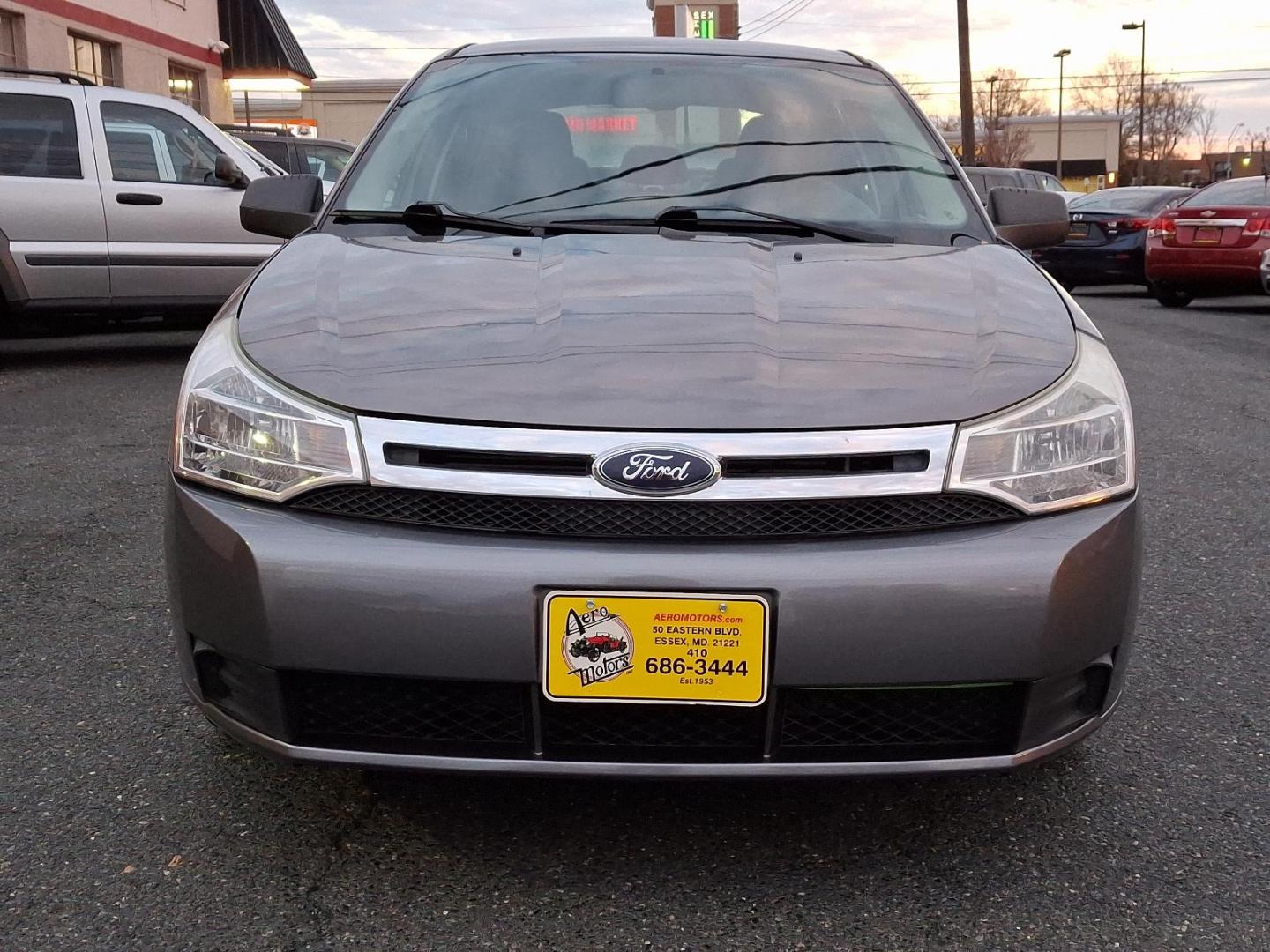 2009 Sterling Grey Metallic - UJ /Charcoal Black - FW Ford Focus SE (1FAHP35N09W) with an 2.0L DOHC 16-VALVE I4 DURATEC ENGINE engine, located at 50 Eastern Blvd., Essex, MD, 21221, (410) 686-3444, 39.304367, -76.484947 - Introducing the 2009 Ford Focus SE 4-Door Sedan-an embodiment of reliability and efficiency. Finished in a sleek gray exterior, this compact sedan combines modern style with practicality, making it an ideal choice for both urban commutes and long-distance travels. Under the hood, the Focus is power - Photo#1