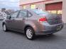 2009 Sterling Grey Metallic - UJ /Charcoal Black - FW Ford Focus SE (1FAHP35N09W) with an 2.0L DOHC 16-VALVE I4 DURATEC ENGINE engine, located at 50 Eastern Blvd., Essex, MD, 21221, (410) 686-3444, 39.304367, -76.484947 - Introducing the 2009 Ford Focus SE 4-Door Sedan-an embodiment of reliability and efficiency. Finished in a sleek gray exterior, this compact sedan combines modern style with practicality, making it an ideal choice for both urban commutes and long-distance travels. Under the hood, the Focus is power - Photo#5