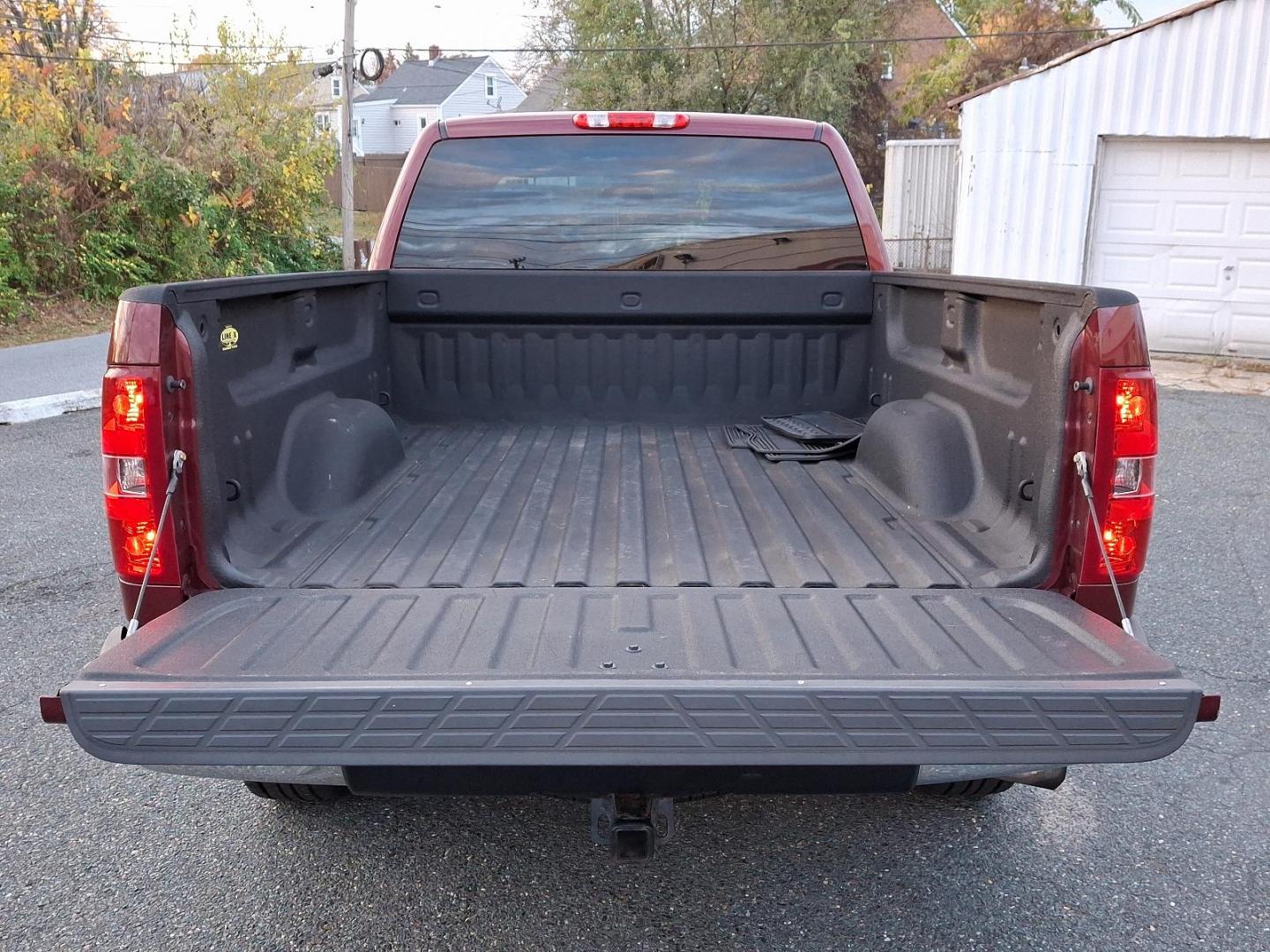 2013 Deep Ruby Metallic - 66U /Ebony - 193 Chevrolet Silverado 1500 LT (1GCRKSE70DZ) with an ENGINE, VORTEC 5.3L VARIABLE VALVE TIMING V8 SFI FLEXFUEL WITH ACTIVE FUEL MANAGEMENT engine, located at 50 Eastern Blvd., Essex, MD, 21221, (410) 686-3444, 39.304367, -76.484947 - Introducing the 2013 Chevrolet Silverado 1500 LT 4WD Extended Cab, a perfect blend of rugged capability and refined comfort. Dressed in a striking Deep Ruby Metallic exterior, this truck boasts an elegant yet aggressive stance that turns heads on and off the road. Step inside to find a spacious ebon - Photo#25