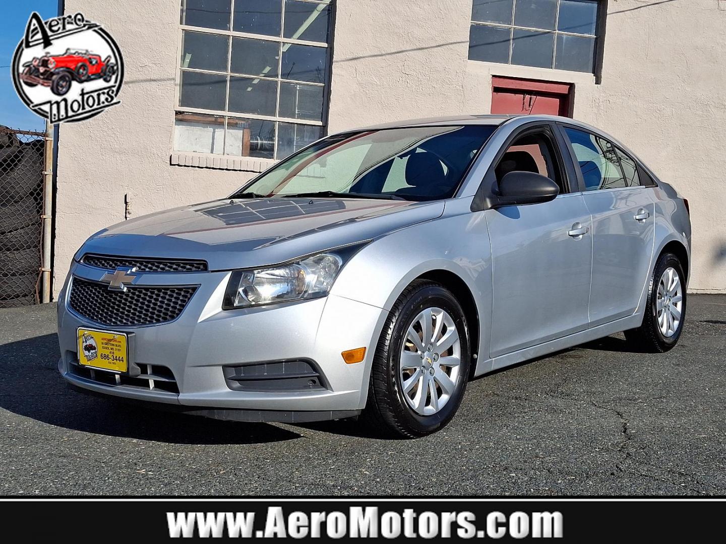 2011 Silver Ice Metallic - GAN /Jet Black/Medium Titanium - AFB Chevrolet Cruze LS (1G1PC5SH6B7) with an ENGINE, ECOTEC 1.8L VARIABLE VALVE TIMING DOHC 4-CYLINDER SEQUENTIAL MFI engine, located at 50 Eastern Blvd., Essex, MD, 21221, (410) 686-3444, 39.304367, -76.484947 - Discover the perfect blend of style and efficiency with this 2011 Chevrolet Cruze LS. Presented in a striking Silver Ice Metallic exterior, this four-door sedan is designed to turn heads while providing a comfortable and refined driving experience. Inside, you'll find a sophisticated Jet Black and M - Photo#0