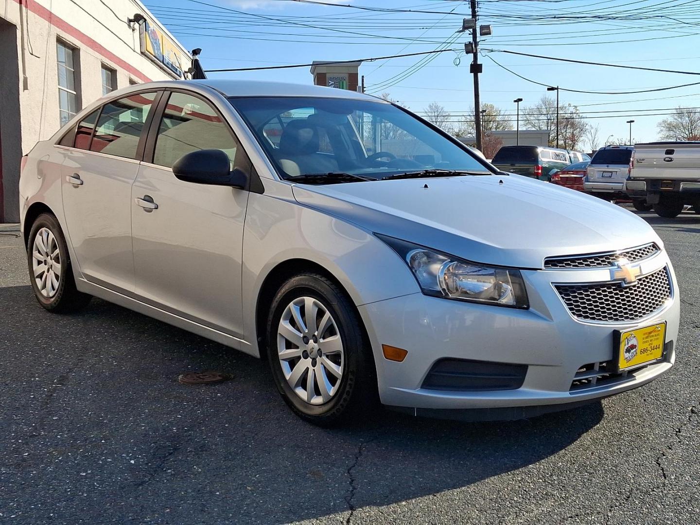 2011 Silver Ice Metallic - GAN /Jet Black/Medium Titanium - AFB Chevrolet Cruze LS (1G1PC5SH6B7) with an ENGINE, ECOTEC 1.8L VARIABLE VALVE TIMING DOHC 4-CYLINDER SEQUENTIAL MFI engine, located at 50 Eastern Blvd., Essex, MD, 21221, (410) 686-3444, 39.304367, -76.484947 - Discover the perfect blend of style and efficiency with this 2011 Chevrolet Cruze LS. Presented in a striking Silver Ice Metallic exterior, this four-door sedan is designed to turn heads while providing a comfortable and refined driving experience. Inside, you'll find a sophisticated Jet Black and M - Photo#2