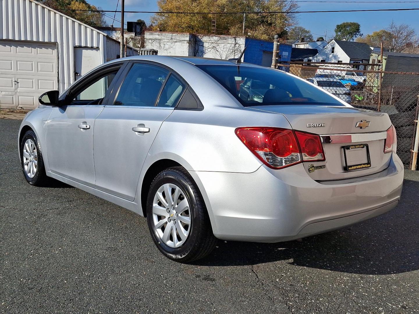 2011 Silver Ice Metallic - GAN /Jet Black/Medium Titanium - AFB Chevrolet Cruze LS (1G1PC5SH6B7) with an ENGINE, ECOTEC 1.8L VARIABLE VALVE TIMING DOHC 4-CYLINDER SEQUENTIAL MFI engine, located at 50 Eastern Blvd., Essex, MD, 21221, (410) 686-3444, 39.304367, -76.484947 - Discover the perfect blend of style and efficiency with this 2011 Chevrolet Cruze LS. Presented in a striking Silver Ice Metallic exterior, this four-door sedan is designed to turn heads while providing a comfortable and refined driving experience. Inside, you'll find a sophisticated Jet Black and M - Photo#5