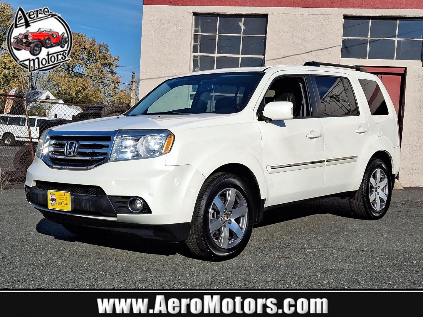 2014 White Diamond Pearl - WA /Black - BK Honda Pilot Touring (5FNYF4H97EB) with an Engine: 3.5L V6 24-Valve SOHC i-VTEC engine, located at 50 Eastern Blvd., Essex, MD, 21221, (410) 686-3444, 39.304367, -76.484947 - Experience the perfect blend of style, comfort, and versatility with the 2014 Honda Pilot Touring 4WD. This sophisticated SUV is finished in a pristine white exterior, exuding elegance and modernity. Powered by a robust 3.5L V6 24-valve SOHC i-VTEC engine, the Pilot delivers a smooth and responsive - Photo#0