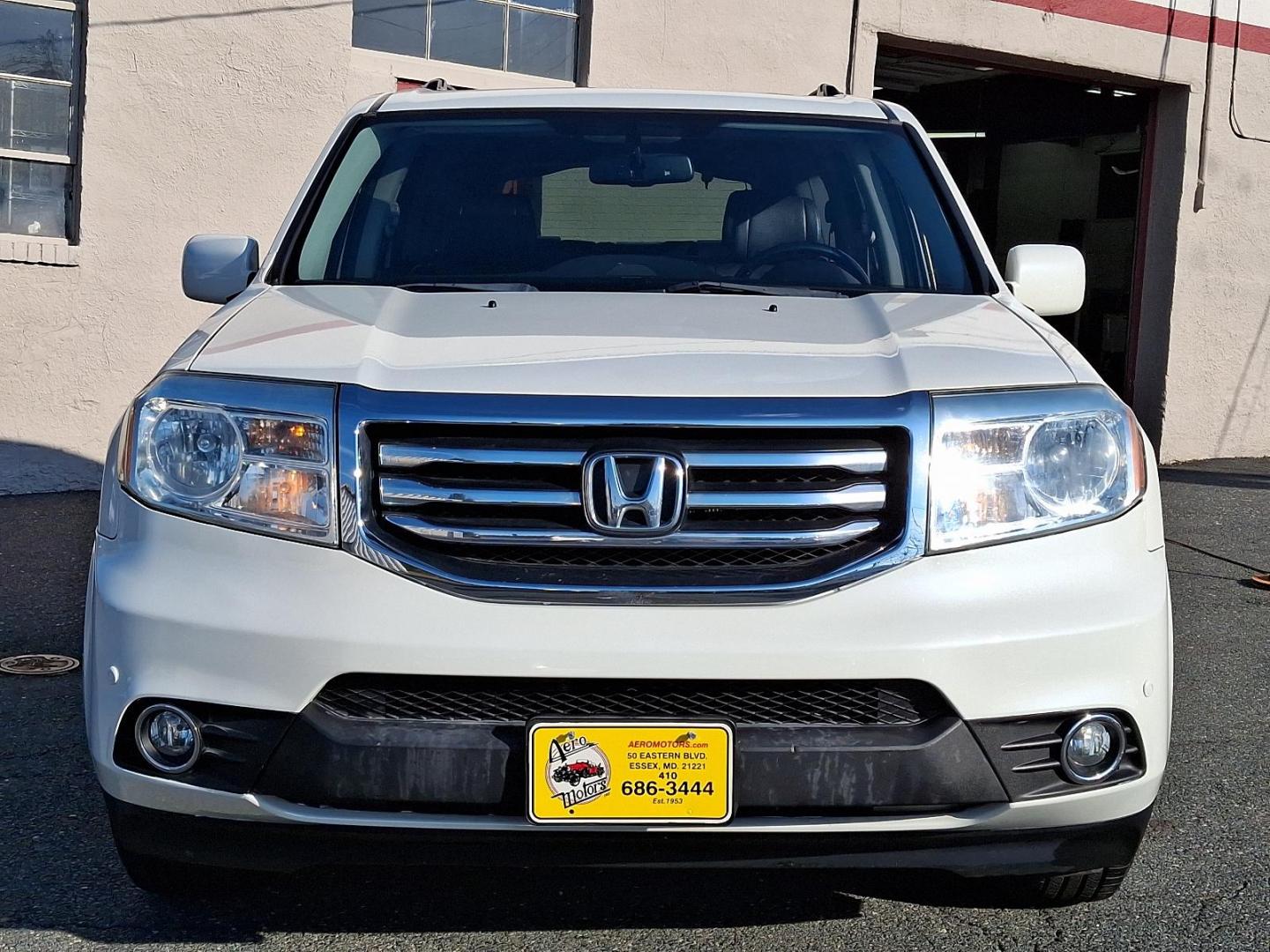 2014 White Diamond Pearl - WA /Black - BK Honda Pilot Touring (5FNYF4H97EB) with an Engine: 3.5L V6 24-Valve SOHC i-VTEC engine, located at 50 Eastern Blvd., Essex, MD, 21221, (410) 686-3444, 39.304367, -76.484947 - Experience the perfect blend of style, comfort, and versatility with the 2014 Honda Pilot Touring 4WD. This sophisticated SUV is finished in a pristine white exterior, exuding elegance and modernity. Powered by a robust 3.5L V6 24-valve SOHC i-VTEC engine, the Pilot delivers a smooth and responsive - Photo#1