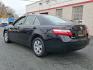 2008 Black - 202 /Bisque - 40 Toyota Camry LE (4T1BE46K18U) with an 2.4L DOHC MPFI VVT-i 16-valve 4-cyl engine engine, located at 50 Eastern Blvd., Essex, MD, 21221, (410) 686-3444, 39.304367, -76.484947 - Introducing the 2008 Toyota Camry LE, a reliable and stylish sedan that exemplifies the perfect blend of performance and comfort. Finished in a sophisticated Black exterior with a refined Bisque interior, this vehicle ensures that you travel in both elegance and convenience. Powered by a robust 2.4 - Photo#5