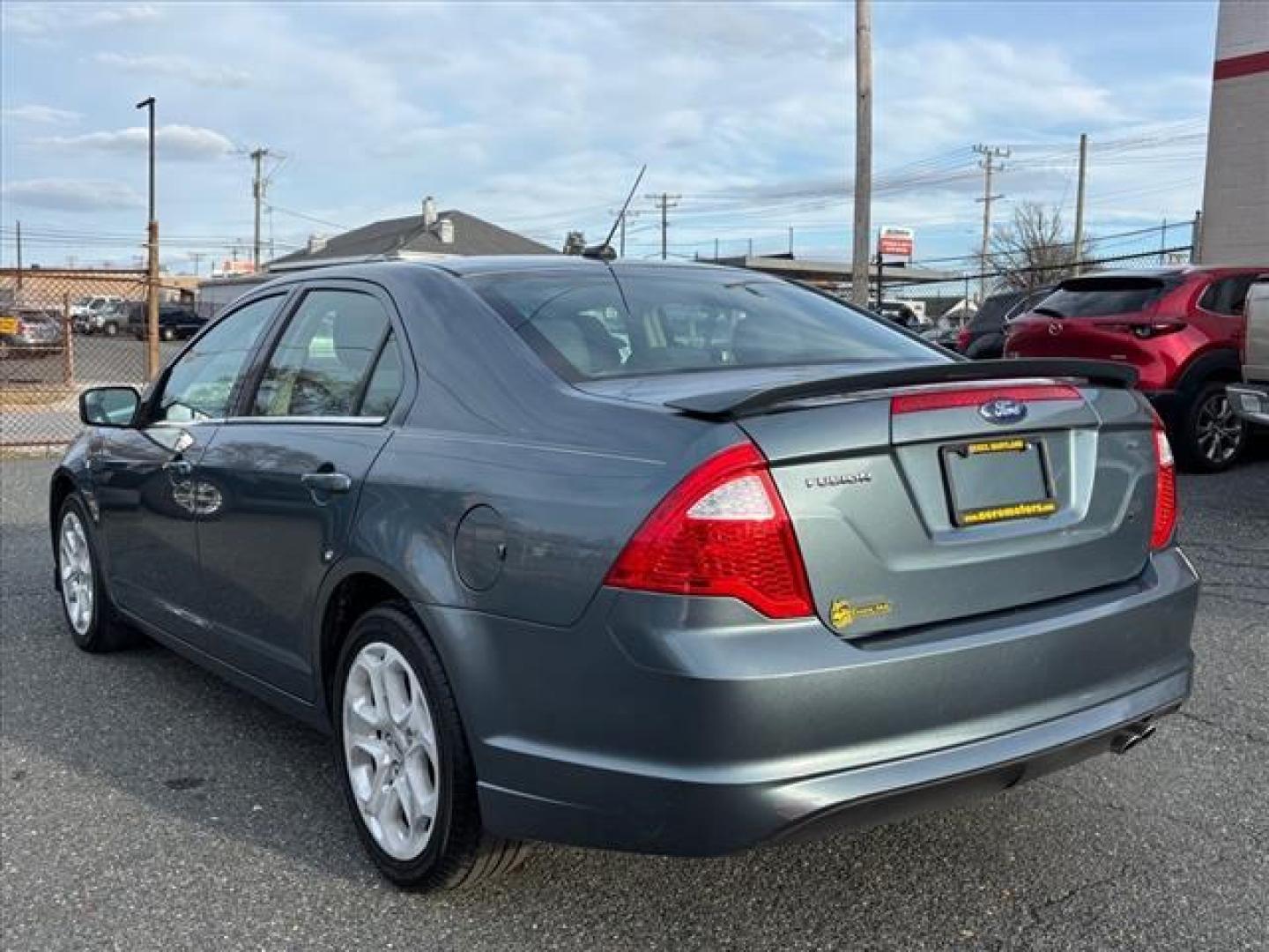 2011 Blue Ford Fusion SE (3FAHP0HA8BR) with an 2.5L 4 Cylinder Sequential-Port F.I. engine, Automatic transmission, located at 50 Eastern Blvd., Essex, MD, 21221, (410) 686-3444, 39.304367, -76.484947 - Photo#2