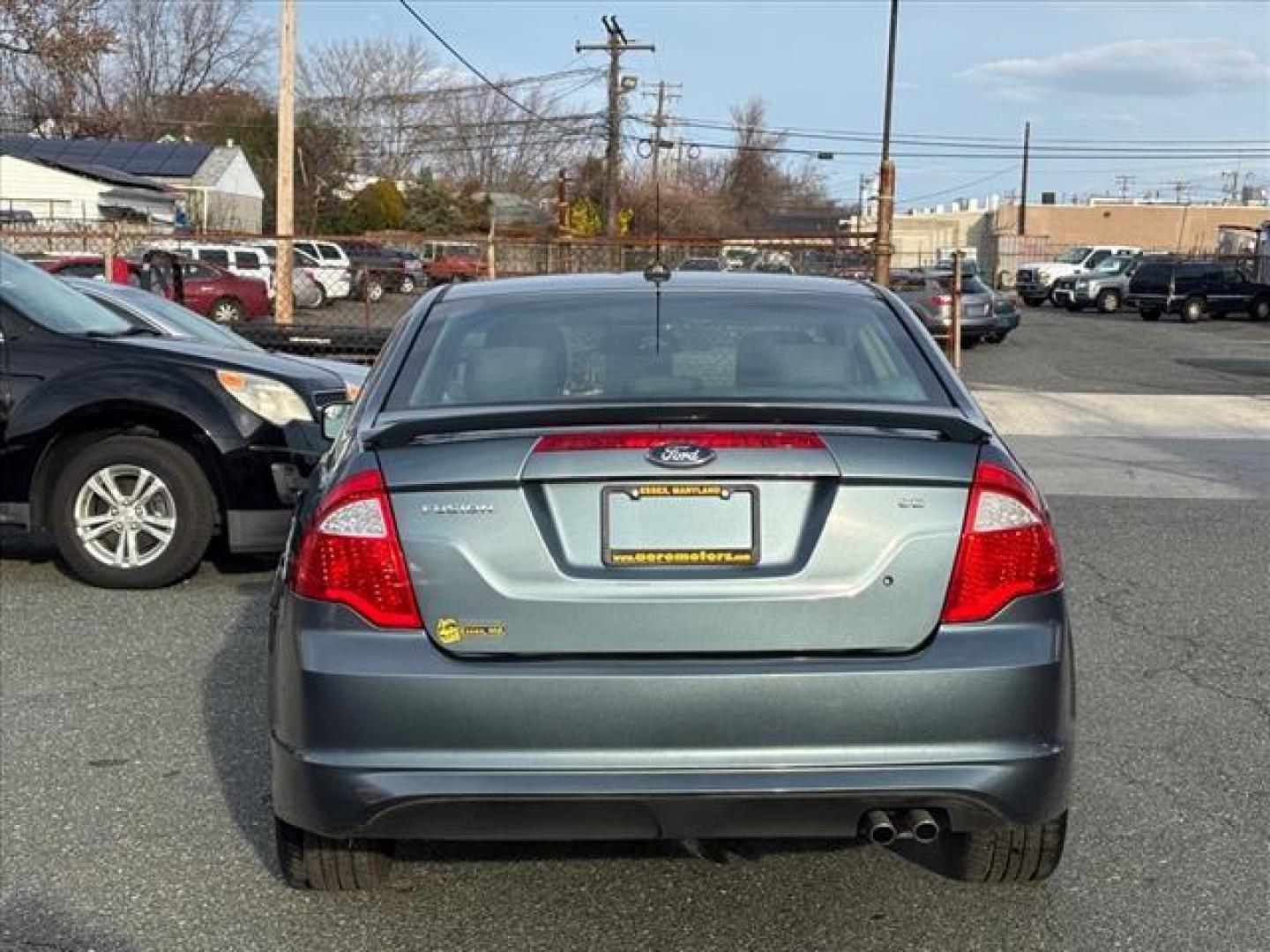 2011 Blue Ford Fusion SE (3FAHP0HA8BR) with an 2.5L 4 Cylinder Sequential-Port F.I. engine, Automatic transmission, located at 50 Eastern Blvd., Essex, MD, 21221, (410) 686-3444, 39.304367, -76.484947 - Photo#3