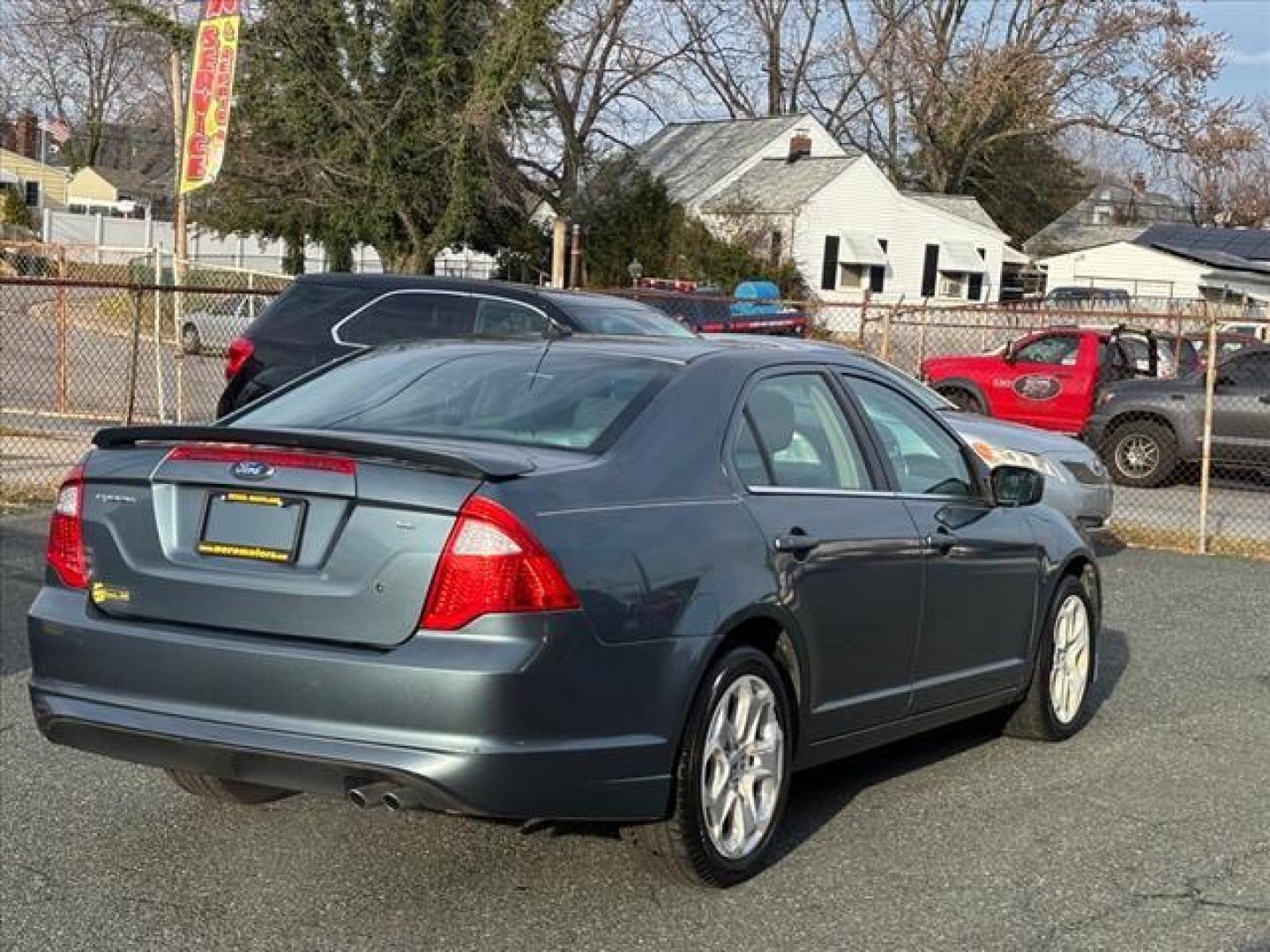 2011 Blue Ford Fusion SE (3FAHP0HA8BR) with an 2.5L 4 Cylinder Sequential-Port F.I. engine, Automatic transmission, located at 50 Eastern Blvd., Essex, MD, 21221, (410) 686-3444, 39.304367, -76.484947 - Photo#4