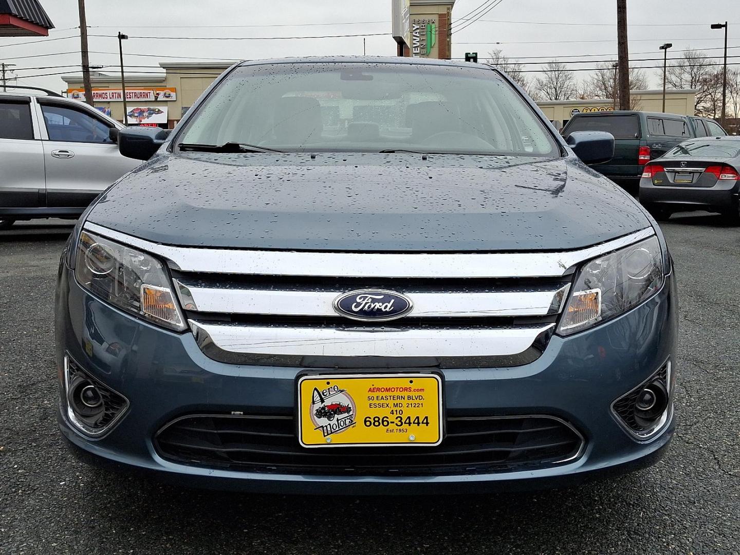 2012 Steel Blue Metallic - UN /Charcoal Black - FW Ford Fusion SEL (3FAHP0JG4CR) with an 3.0L 24V V6 DURATEC FLEX FUEL ENGINE engine, located at 50 Eastern Blvd., Essex, MD, 21221, (410) 686-3444, 39.304367, -76.484947 - Introducing the 2012 Ford Fusion SEL, a stylish and reliable sedan that combines performance with practicality. This elegant blue 4-door vehicle is powered by a robust 3.0L 24V V6 Duratec flex-fuel engine, delivering both power and efficiency for your daily commutes and weekend getaways. The Fusio - Photo#1