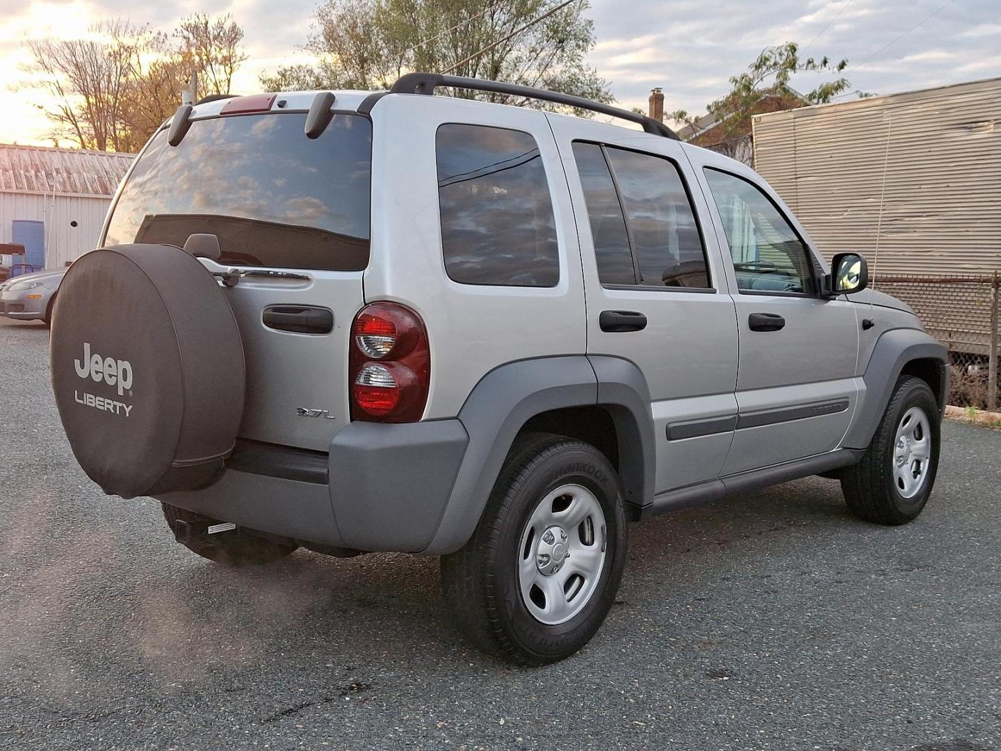 2005 Bright Silver Metallic - PS2 /Med Slate Gray - D5 Jeep Liberty Sport (1J4GL48K95W) with an 3.7L V6 ENGINE engine, located at 50 Eastern Blvd., Essex, MD, 21221, (410) 686-3444, 39.304367, -76.484947 - Introducing the 2005 Jeep Liberty Sport 4dr 4WD, an ideal blend of style and capability. This robust SUV comes in an eye-catching bright silver metallic exterior, perfectly complemented by a comfortable med slate gray interior. Powered by a dependable 3.7L V6 engine, the Liberty delivers both power - Photo#3