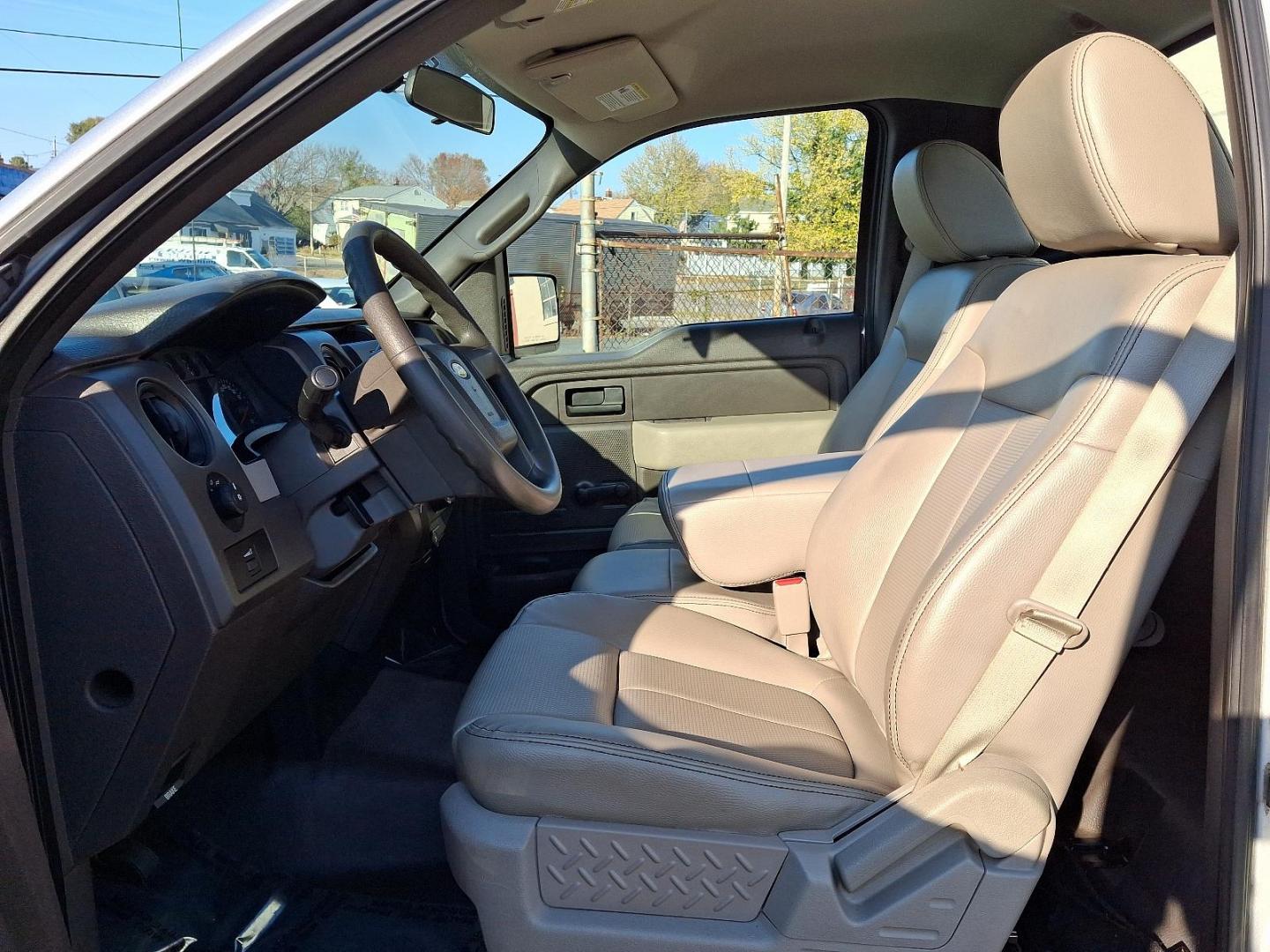 2009 Brilliant Silver Metallic - UI /Medium Stone - AE Ford F-150 XL (1FTRF12819K) with an 4.6L 3V EFI V8 ENGINE engine, located at 50 Eastern Blvd., Essex, MD, 21221, (410) 686-3444, 39.304367, -76.484947 - Discover the perfect blend of power and versatility with this 2009 Ford F-150, featuring a sleek silver exterior that exudes professionalism and style. Renowned for its robust performance and reliability, this iconic pickup truck is equipped to handle both work and play with ease. Under the hood, t - Photo#11