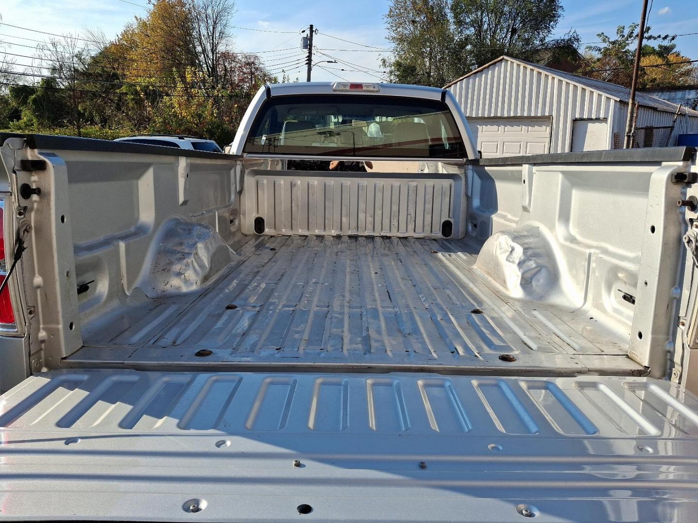 2009 Brilliant Silver Metallic - UI /Medium Stone - AE Ford F-150 XL (1FTRF12819K) with an 4.6L 3V EFI V8 ENGINE engine, located at 50 Eastern Blvd., Essex, MD, 21221, (410) 686-3444, 39.304367, -76.484947 - Discover the perfect blend of power and versatility with this 2009 Ford F-150, featuring a sleek silver exterior that exudes professionalism and style. Renowned for its robust performance and reliability, this iconic pickup truck is equipped to handle both work and play with ease. Under the hood, t - Photo#19