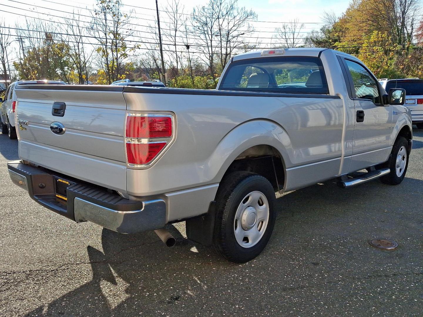 2009 Brilliant Silver Metallic - UI /Medium Stone - AE Ford F-150 XL (1FTRF12819K) with an 4.6L 3V EFI V8 ENGINE engine, located at 50 Eastern Blvd., Essex, MD, 21221, (410) 686-3444, 39.304367, -76.484947 - Discover the perfect blend of power and versatility with this 2009 Ford F-150, featuring a sleek silver exterior that exudes professionalism and style. Renowned for its robust performance and reliability, this iconic pickup truck is equipped to handle both work and play with ease. Under the hood, t - Photo#3