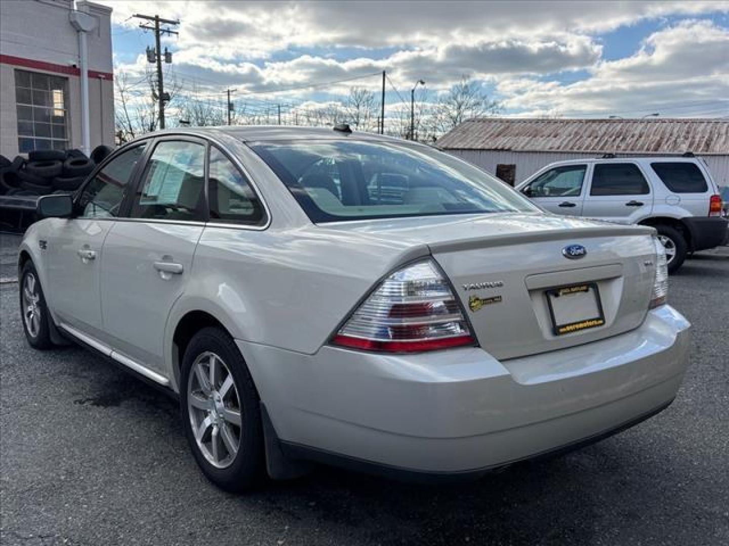 2008 Tan Ford Taurus SEL (1FAHP24WX8G) with an 3.5L 6 Cylinder Sequential-Port F.I. engine, Automatic transmission, located at 50 Eastern Blvd., Essex, MD, 21221, (410) 686-3444, 39.304367, -76.484947 - Photo#2