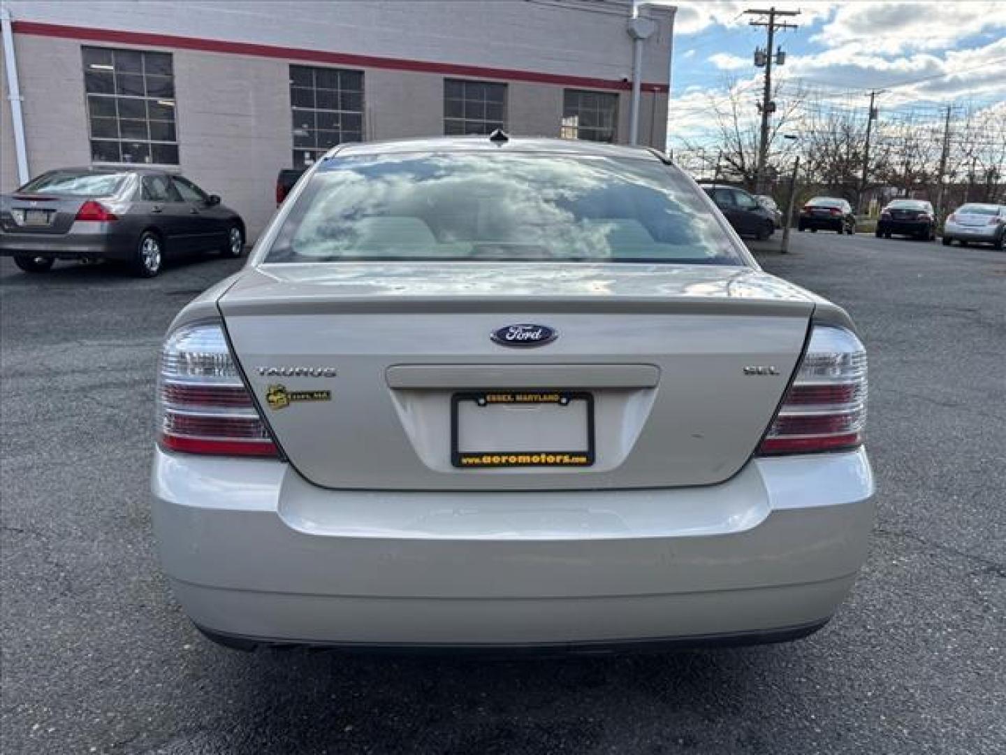 2008 Tan Ford Taurus SEL (1FAHP24WX8G) with an 3.5L 6 Cylinder Sequential-Port F.I. engine, Automatic transmission, located at 50 Eastern Blvd., Essex, MD, 21221, (410) 686-3444, 39.304367, -76.484947 - Photo#3