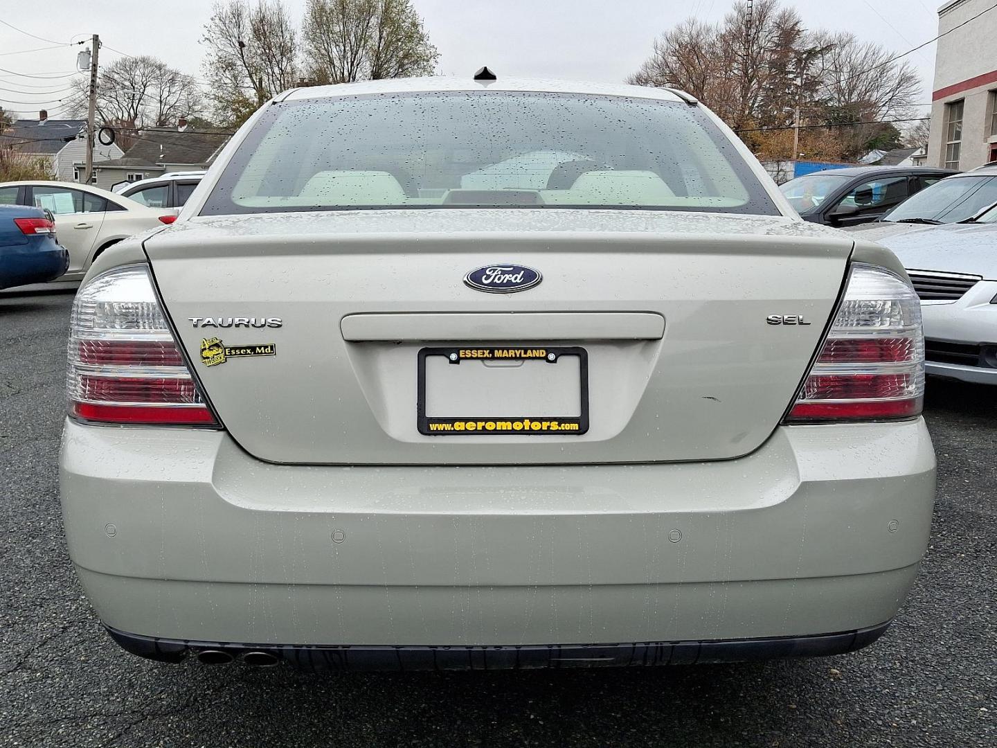 2008 Light Sage Metallic - NH /Camel - C Ford Taurus SEL (1FAHP24WX8G) with an 3.5L DOHC SMPI 24-VALVE V6 DURATEC ENGINE engine, located at 50 Eastern Blvd., Essex, MD, 21221, (410) 686-3444, 39.304367, -76.484947 - Discover the perfect blend of style, comfort, and performance with this 2008 Ford Taurus SEL. Featuring a sophisticated tan exterior, this sedan is a timeless addition to any driveway. Under the hood, you'll find a robust 3.5L DOHC SMPI 24-valve V6 Duratec engine, delivering a smooth and powerful dr - Photo#4