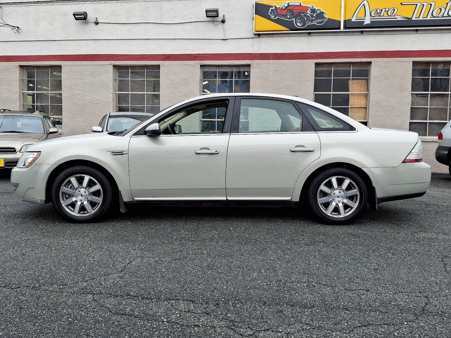 2008 Light Sage Metallic - NH /Camel - C Ford Taurus SEL (1FAHP24WX8G) with an 3.5L DOHC SMPI 24-VALVE V6 DURATEC ENGINE engine, located at 50 Eastern Blvd., Essex, MD, 21221, (410) 686-3444, 39.304367, -76.484947 - Discover the perfect blend of style, comfort, and performance with this 2008 Ford Taurus SEL. Featuring a sophisticated tan exterior, this sedan is a timeless addition to any driveway. Under the hood, you'll find a robust 3.5L DOHC SMPI 24-valve V6 Duratec engine, delivering a smooth and powerful dr - Photo#6