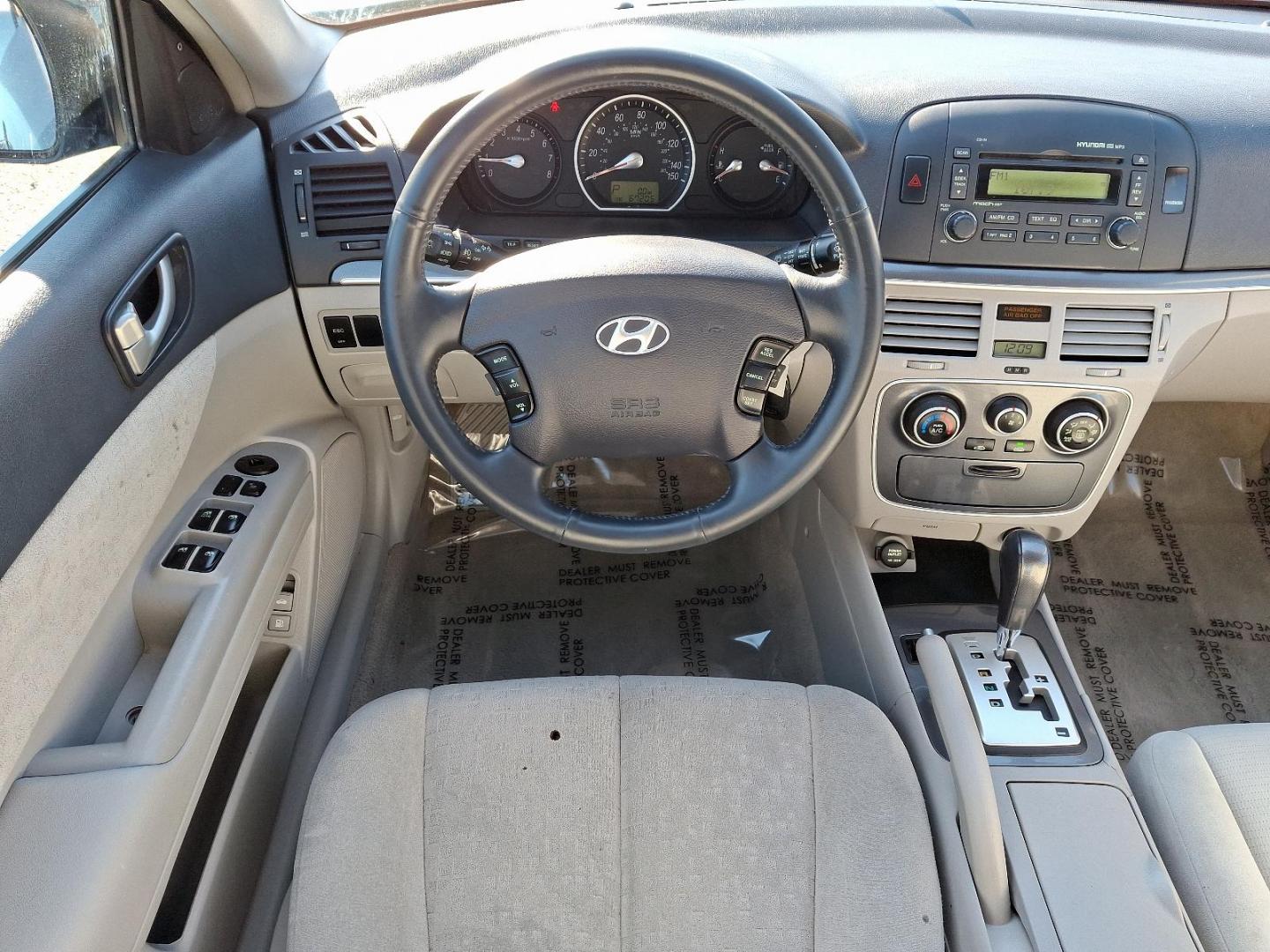 2006 BLUE HYUNDAI SONATA (1NPEU46C46H) , located at 50 Eastern Blvd., Essex, MD, 21221, (410) 686-3444, 39.304367, -76.484947 - Introducing the 2006 Hyundai Sonata, a spacious and reliable sedan designed to elevate your driving experience. Finished in a striking blue exterior, this Sonata combines style with practicality, making it an ideal choice for both urban commuting and weekend adventures. Under the hood, the efficie - Photo#10