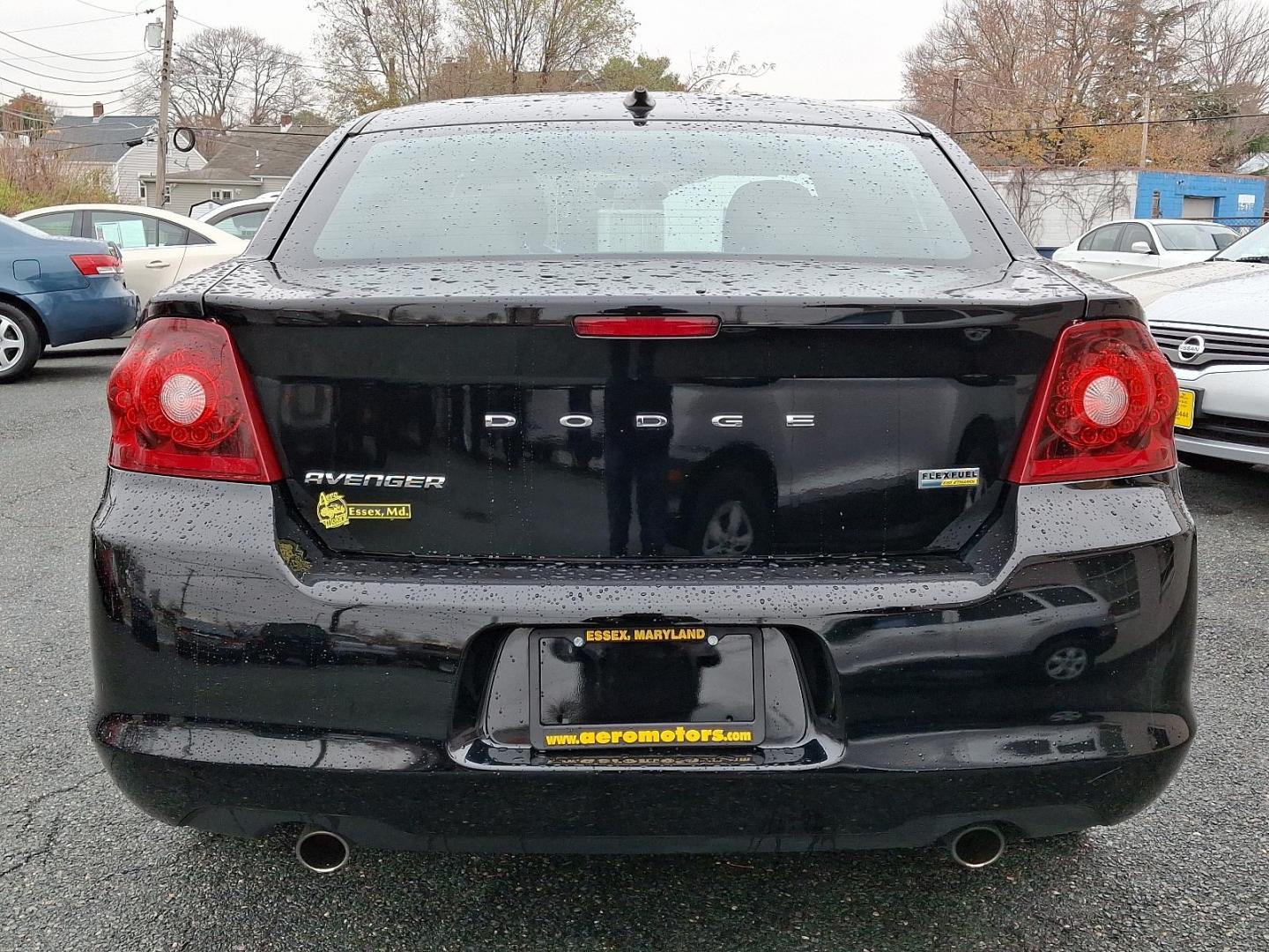 2011 Black - PX8 /Black Interior - C7X9 Dodge Avenger Express (1B3BD4FG4BN) with an 3.6L VVT FLEX-FUEL 24-VALVE V6 ENGINE engine, located at 50 Eastern Blvd., Essex, MD, 21221, (410) 686-3444, 39.304367, -76.484947 - Introducing the 2011 Dodge Avenger, a striking sedan that combines style, performance, and comfort. With its bold black exterior, the Avenger commands attention on the road while offering a dynamic driving experience. This vehicle boasts a powerful 2.4L 4-cylinder engine, ensuring a responsive perfo - Photo#4