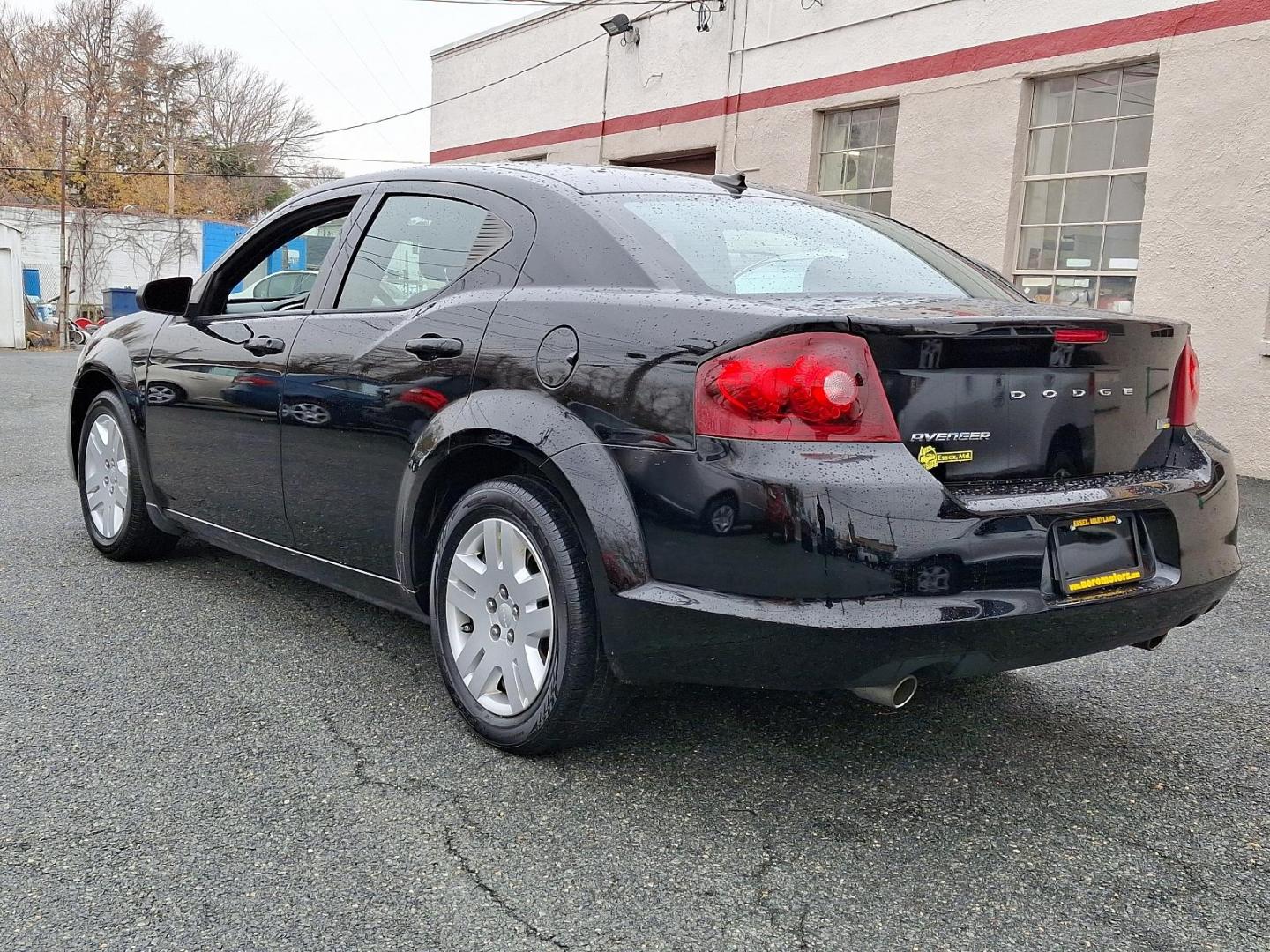 2011 Black - PX8 /Black Interior - C7X9 Dodge Avenger Express (1B3BD4FG4BN) with an 3.6L VVT FLEX-FUEL 24-VALVE V6 ENGINE engine, located at 50 Eastern Blvd., Essex, MD, 21221, (410) 686-3444, 39.304367, -76.484947 - Introducing the 2011 Dodge Avenger, a striking sedan that combines style, performance, and comfort. With its bold black exterior, the Avenger commands attention on the road while offering a dynamic driving experience. This vehicle boasts a powerful 2.4L 4-cylinder engine, ensuring a responsive perfo - Photo#5