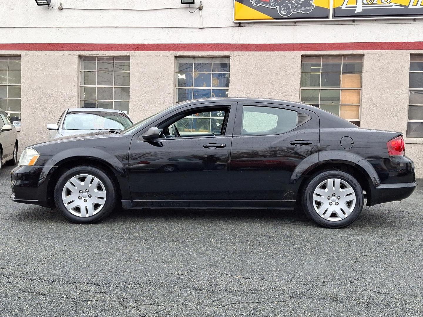 2011 Black - PX8 /Black Interior - C7X9 Dodge Avenger Express (1B3BD4FG4BN) with an 3.6L VVT FLEX-FUEL 24-VALVE V6 ENGINE engine, located at 50 Eastern Blvd., Essex, MD, 21221, (410) 686-3444, 39.304367, -76.484947 - Introducing the 2011 Dodge Avenger, a striking sedan that combines style, performance, and comfort. With its bold black exterior, the Avenger commands attention on the road while offering a dynamic driving experience. This vehicle boasts a powerful 2.4L 4-cylinder engine, ensuring a responsive perfo - Photo#6