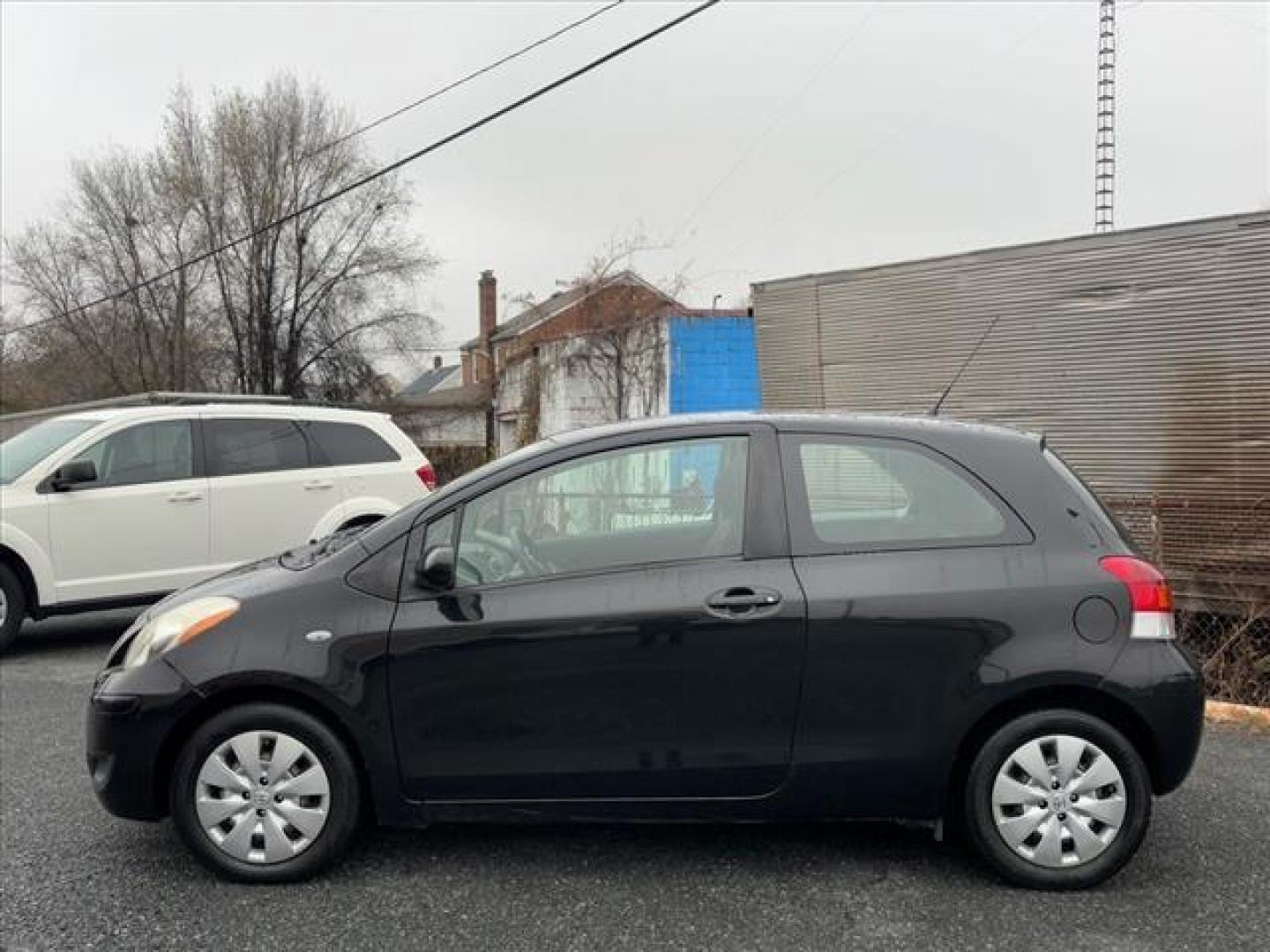 2011 Black Toyota Yaris Base (JTDJT4K31B5) with an 1.5L 4 Cylinder Sequential-Port F.I. engine, Automatic transmission, located at 50 Eastern Blvd., Essex, MD, 21221, (410) 686-3444, 39.304367, -76.484947 - Photo#1