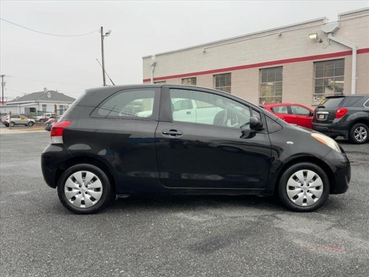 2011 Black Toyota Yaris Base (JTDJT4K31B5) with an 1.5L 4 Cylinder Sequential-Port F.I. engine, Automatic transmission, located at 50 Eastern Blvd., Essex, MD, 21221, (410) 686-3444, 39.304367, -76.484947 - Photo#6