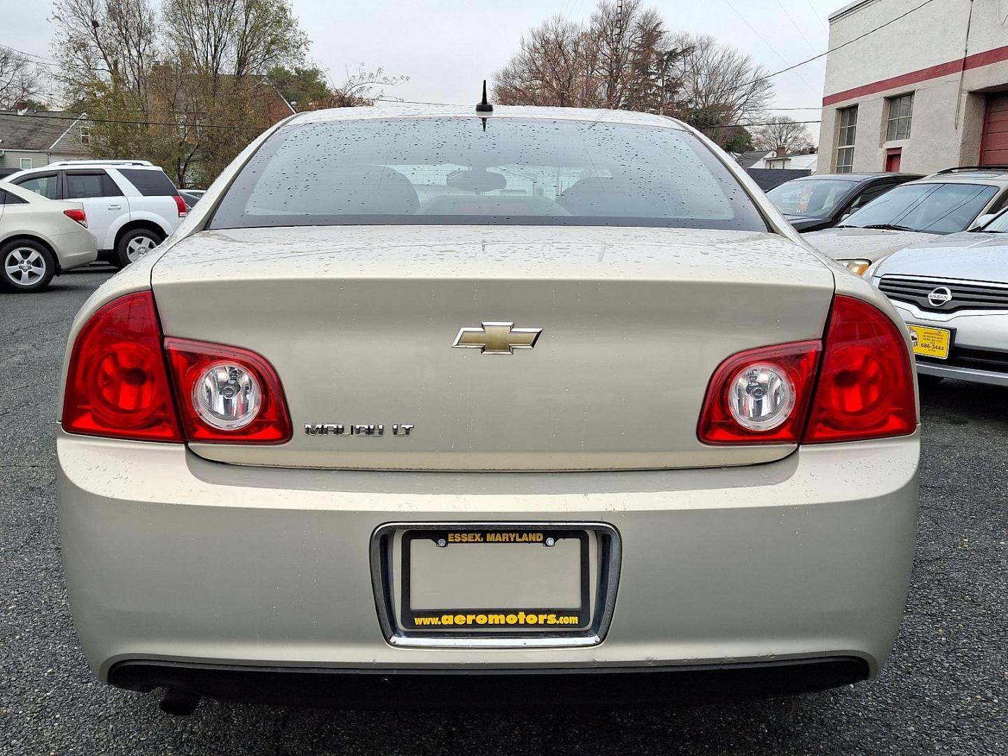 2011 Gold Mist Metallic - GAO /Cocoa/Cashmere - 34B Chevrolet Malibu LT w/1LT (1G1ZC5E14BF) with an ENGINE, ECOTEC 2.4L DOHC, 16-VALVE, 4-CYLINDER VARIABLE VALVE TIMING MFI engine, located at 50 Eastern Blvd., Essex, MD, 21221, (410) 686-3444, 39.304367, -76.484947 - Introducing the 2011 Chevrolet Malibu - a perfect blend of style, comfort, and reliability. This sophisticated sedan features a stunning gold exterior that exudes elegance and class, making a statement wherever you go. With a spacious interior designed for both driver and passengers, the Malibu prov - Photo#4