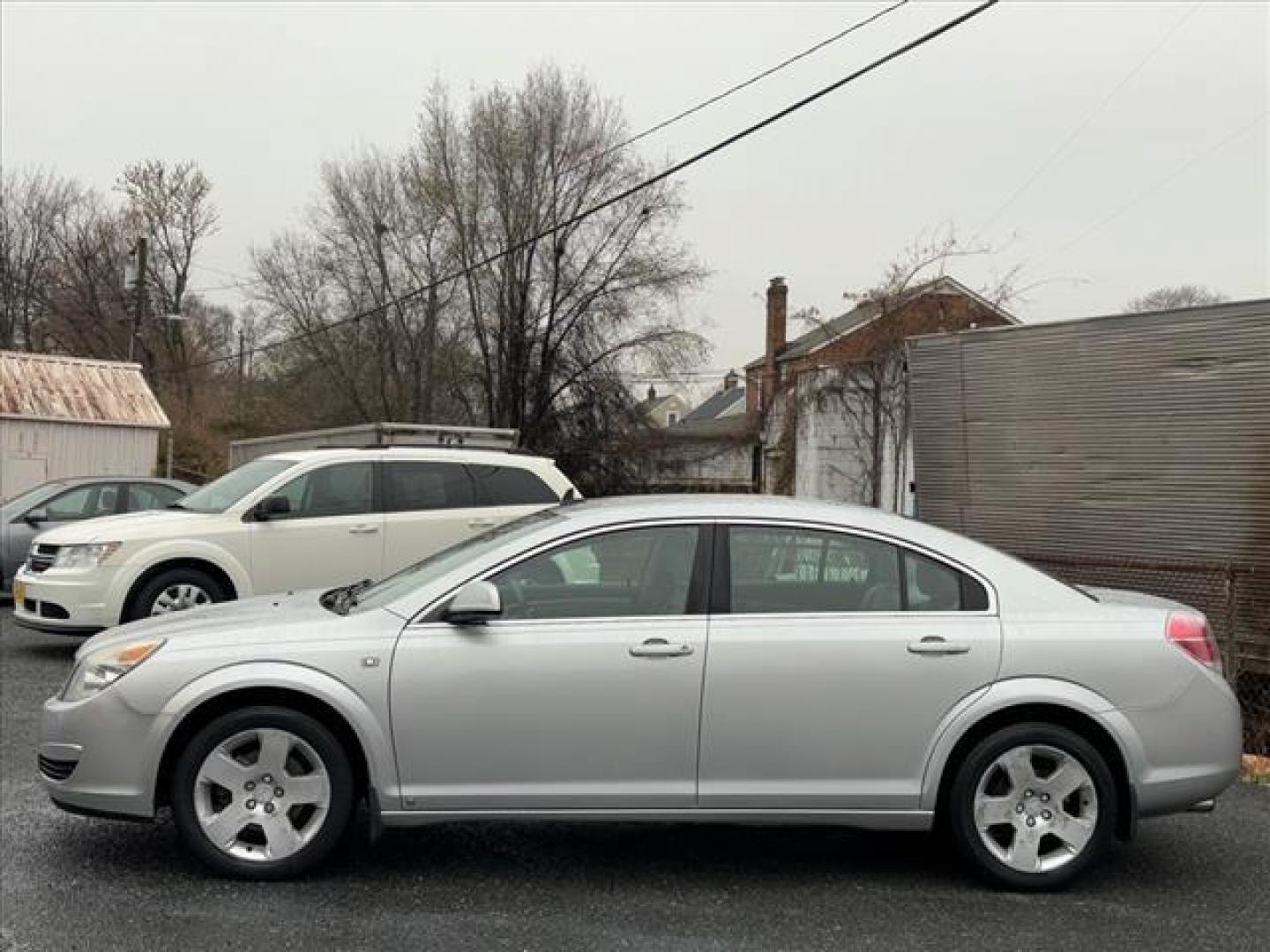 2009 Silver Saturn Aura XE (1G8ZS57B99F) with an 2.4L 4 Cylinder Sequential-Port F.I. engine, Automatic transmission, located at 50 Eastern Blvd., Essex, MD, 21221, (410) 686-3444, 39.304367, -76.484947 - Photo#1