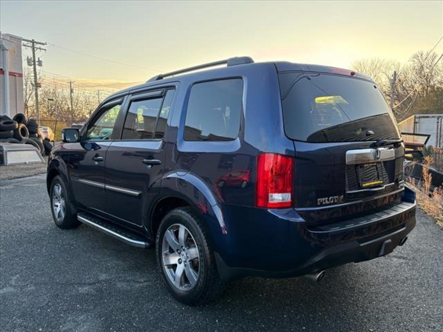 2013 Blue Honda Pilot Touring (5FNYF4H99DB) with an 3.5L 6 Cylinder Sequential-Port F.I. engine, AWD transmission, located at 50 Eastern Blvd., Essex, MD, 21221, (410) 686-3444, 39.304367, -76.484947 - Photo#2