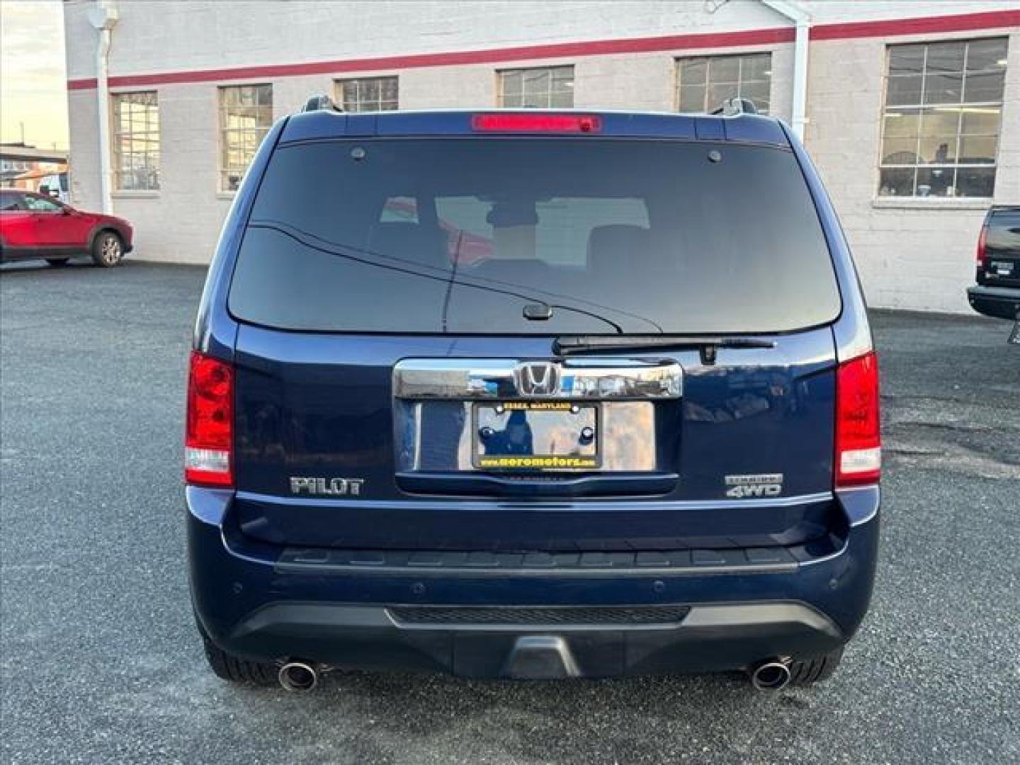 2013 Blue Honda Pilot Touring (5FNYF4H99DB) with an 3.5L 6 Cylinder Sequential-Port F.I. engine, AWD transmission, located at 50 Eastern Blvd., Essex, MD, 21221, (410) 686-3444, 39.304367, -76.484947 - Photo#3