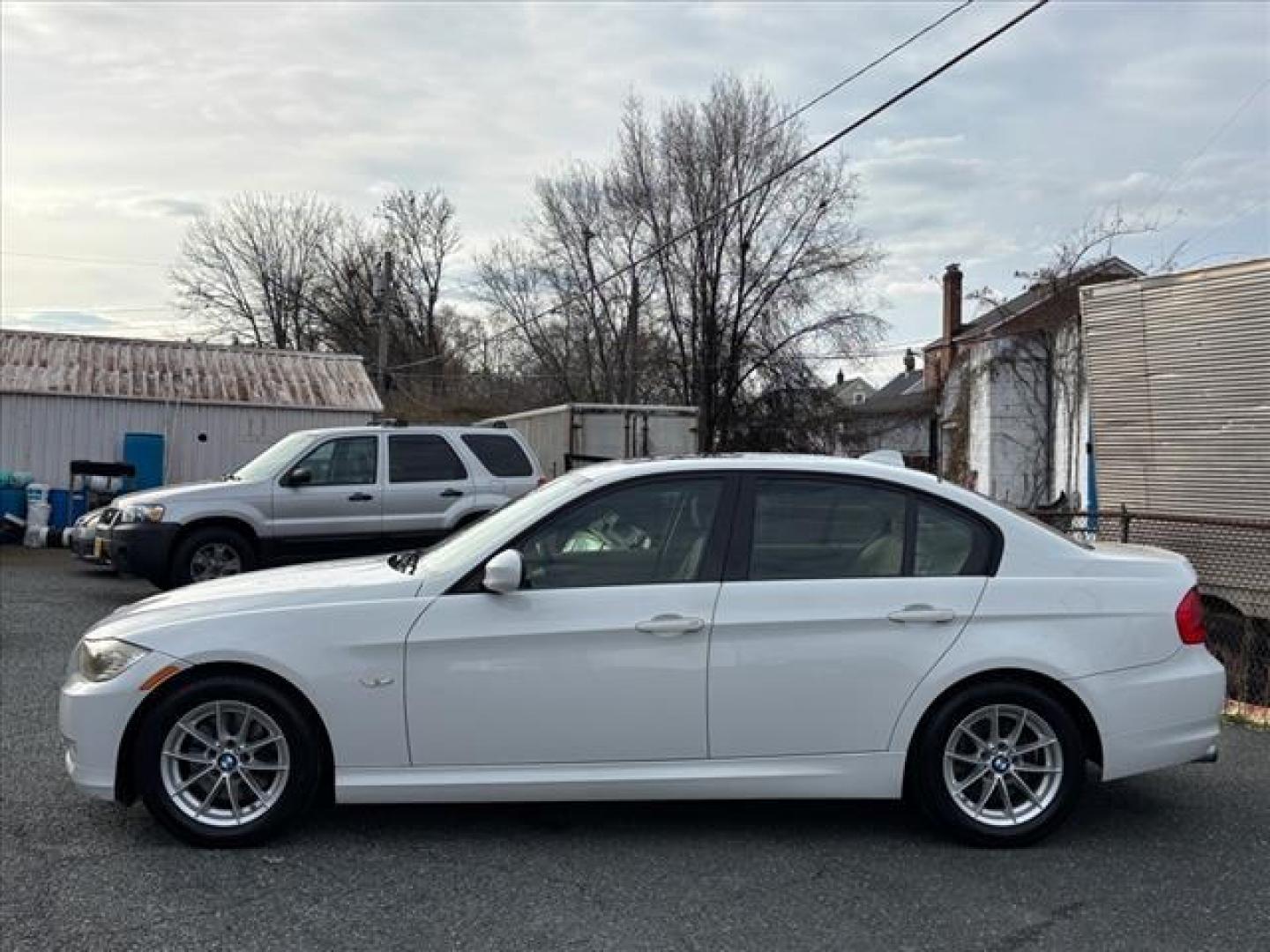 2010 White BMW 3 Series 328i (WBAPH7G58AN) with an 3.0L 6 Cylinder Fuel Injected engine, Automatic transmission, located at 50 Eastern Blvd., Essex, MD, 21221, (410) 686-3444, 39.304367, -76.484947 - Photo#1