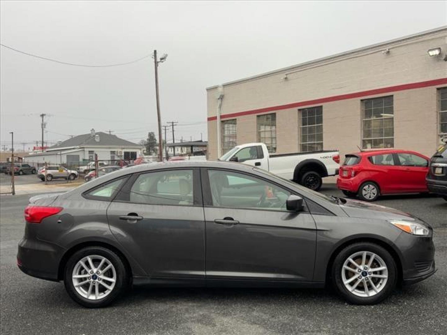 2018 Gray Ford Focus SE (1FADP3F26JL) with an 2.0L 4 Cylinder Fuel Injected engine, Automatic transmission, located at 50 Eastern Blvd., Essex, MD, 21221, (410) 686-3444, 39.304367, -76.484947 - Photo#6