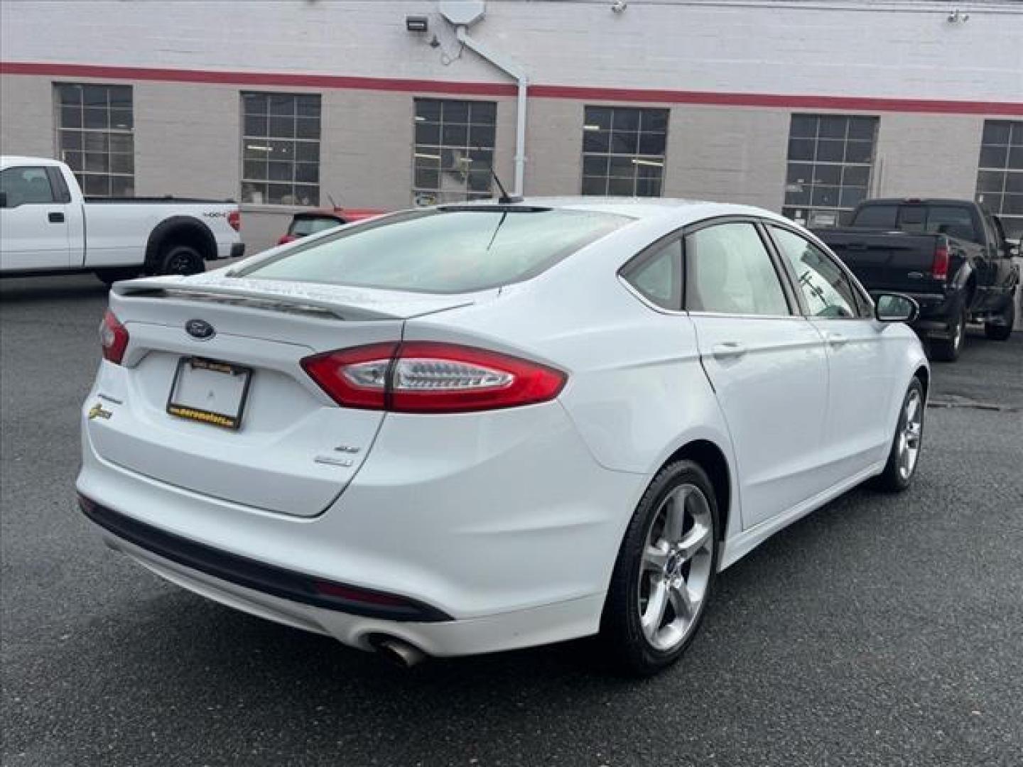 2016 White Ford Fusion SE (3FA6P0HD6GR) with an 1.5L 4 Cylinder Turbocharged engine, Automatic transmission, located at 50 Eastern Blvd., Essex, MD, 21221, (410) 686-3444, 39.304367, -76.484947 - Photo#4