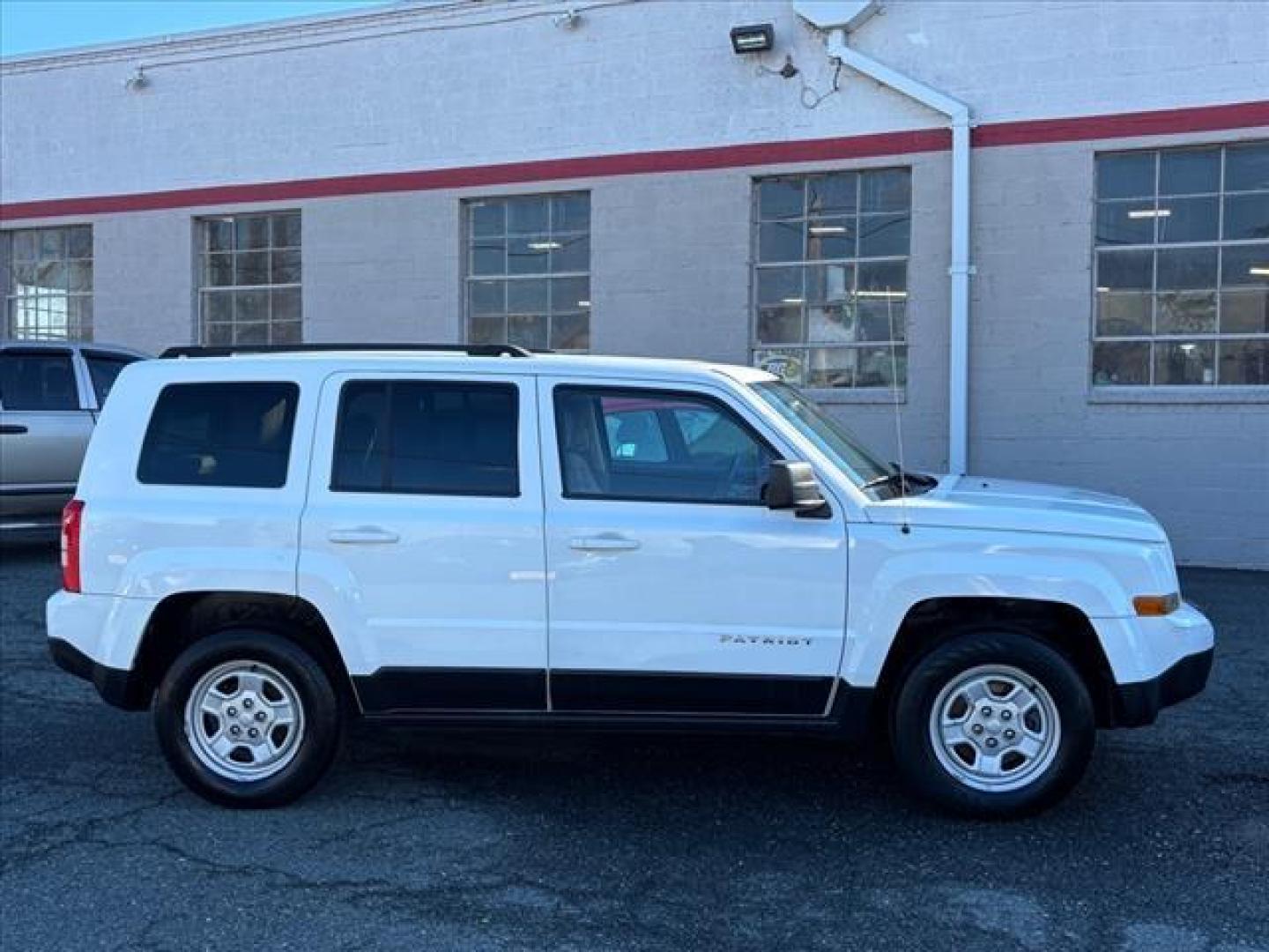 2014 White Jeep Patriot Sport (1C4NJRBB5ED) with an 2.4L 4 Cylinder Sequential-Port F.I. engine, 4X4 transmission, located at 50 Eastern Blvd., Essex, MD, 21221, (410) 686-3444, 39.304367, -76.484947 - Photo#5