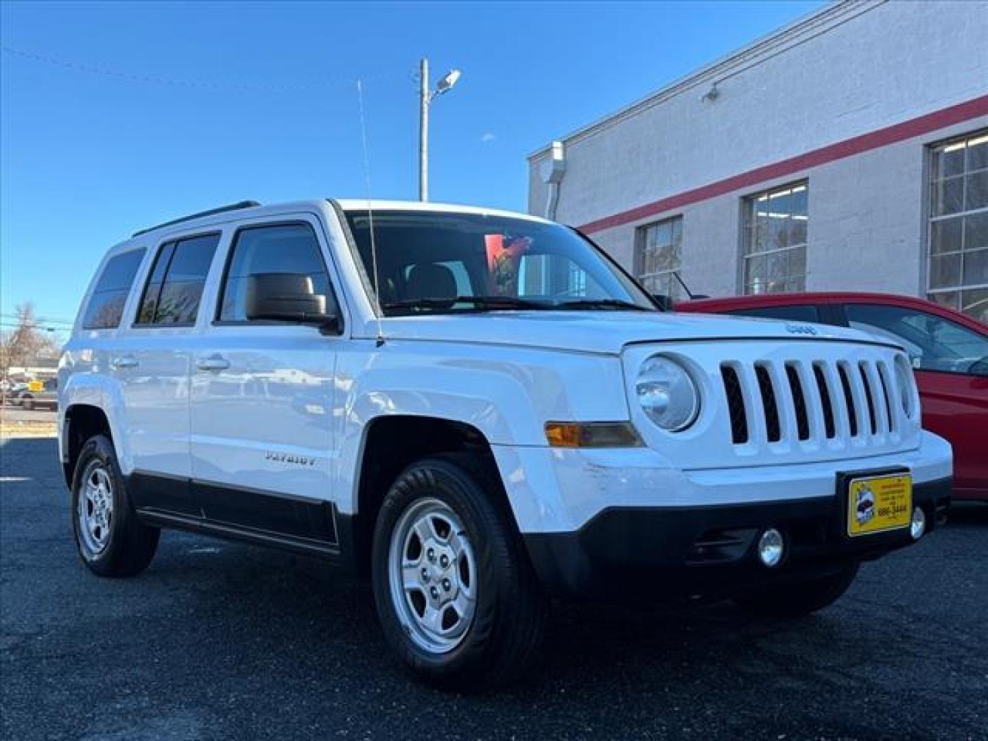 2014 White Jeep Patriot Sport (1C4NJRBB5ED) with an 2.4L 4 Cylinder Sequential-Port F.I. engine, 4X4 transmission, located at 50 Eastern Blvd., Essex, MD, 21221, (410) 686-3444, 39.304367, -76.484947 - Photo#6