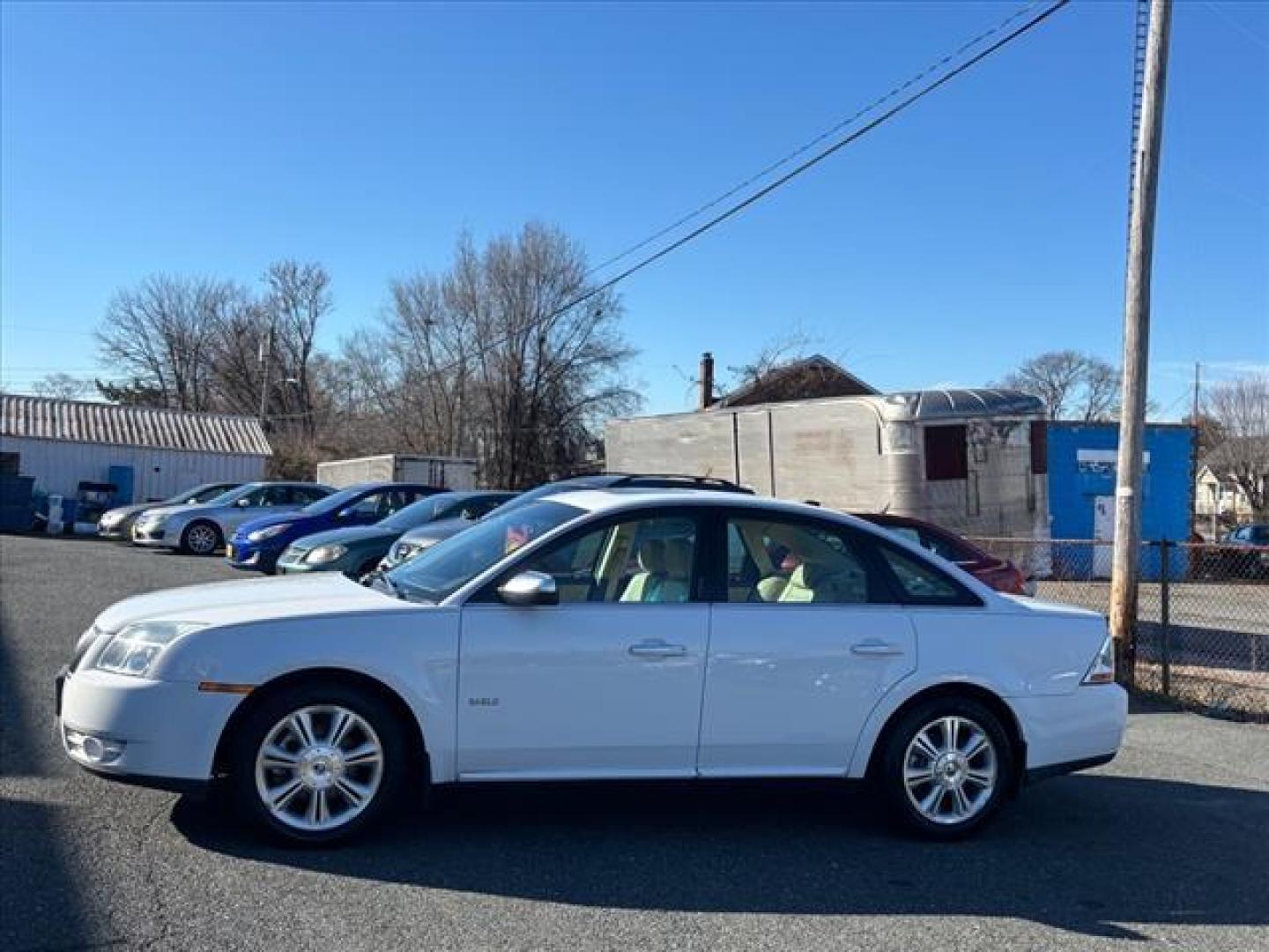 2008 White Mercury Sable Premier (1MEHM42W88G) with an 3.5L 6 Cylinder Fuel Injected engine, Automatic transmission, located at 50 Eastern Blvd., Essex, MD, 21221, (410) 686-3444, 39.304367, -76.484947 - Photo#1