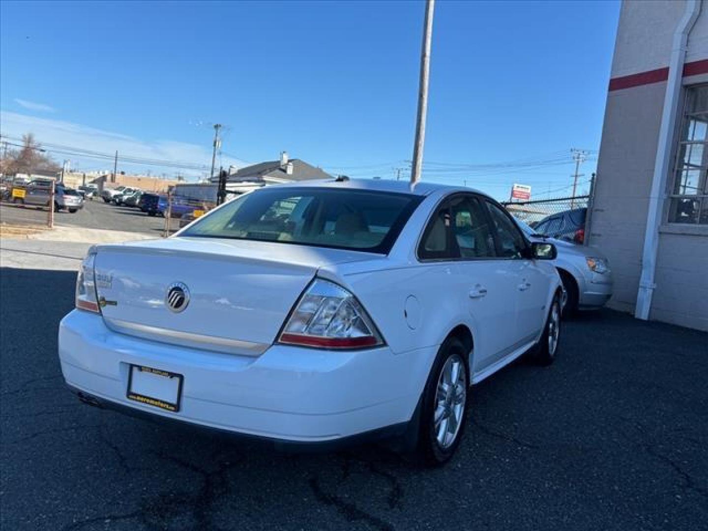 2008 White Mercury Sable Premier (1MEHM42W88G) with an 3.5L 6 Cylinder Fuel Injected engine, Automatic transmission, located at 50 Eastern Blvd., Essex, MD, 21221, (410) 686-3444, 39.304367, -76.484947 - Photo#4